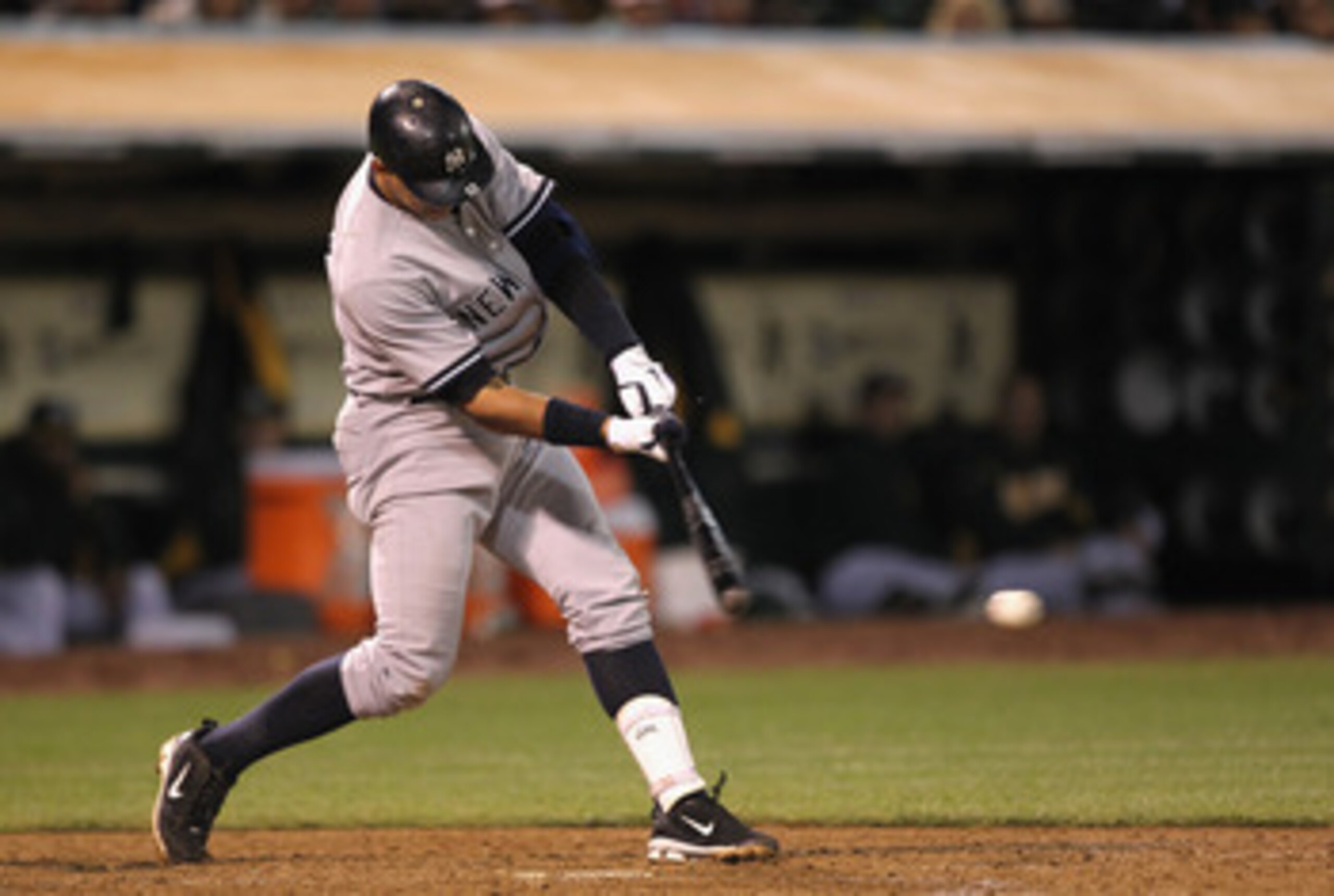 OAKLAND, CA - MAY 31:  Alex Rodriguez #13 of the New York Yankees hits a two run single in the sixth inning against the Oakland Athletics at Oakland-Alameda County Coliseum on May 31, 2011 in Oakland, California.  (Photo by Ezra Shaw/Getty Images)