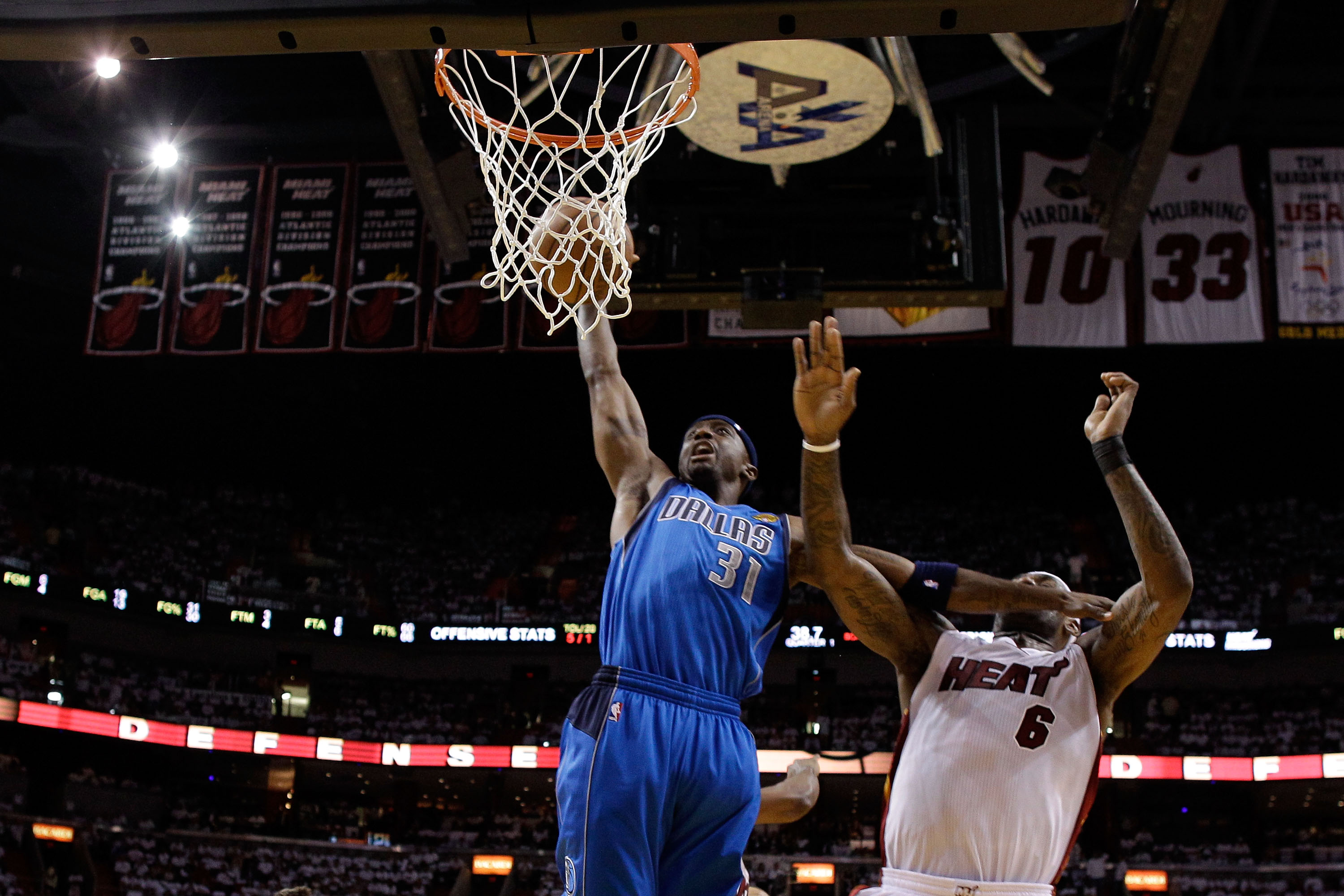 MIAMI, FL - MAY 31:  Jason Terry #31 of the Dallas Mavericks goes up for a dunk against Dwyane Wade #3 of the Miami Heat in the first half in Game One of the 2011 NBA Finals at American Airlines Arena on May 31, 2011 in Miami, Florida. NOTE TO USER: User
