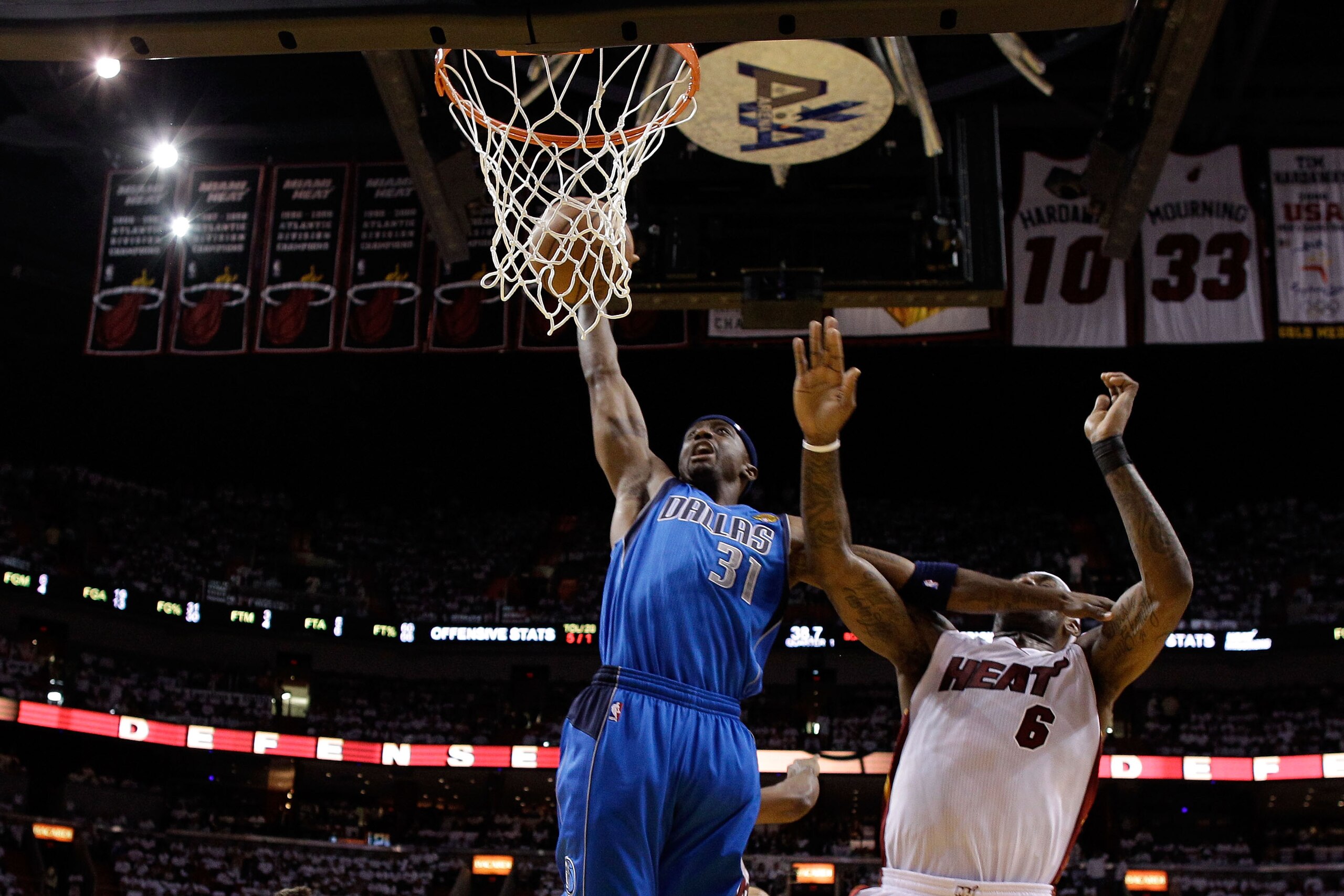 MIAMI, FL - MAY 31: Jason Terry #31 of the Dallas Mavericks goes up for a dunk against Dwyane Wade #3 of the Miami Heat in the first half in Game One of the 2011 NBA Finals at American Airlines Arena on May 31, 2011 in Miami, Florida. NOTE TO USER: User MIAMI, FL - MAY 31: Jason Terry #31 of the Dallas Mavericks goes up for a dunk against Dwyane Wade #3 of the Miami Heat in the first half in Game One of the 2011 NBA Finals at American Airlines Arena on May 31, 2011 in Miami, Florida. NOTE TO USER: User