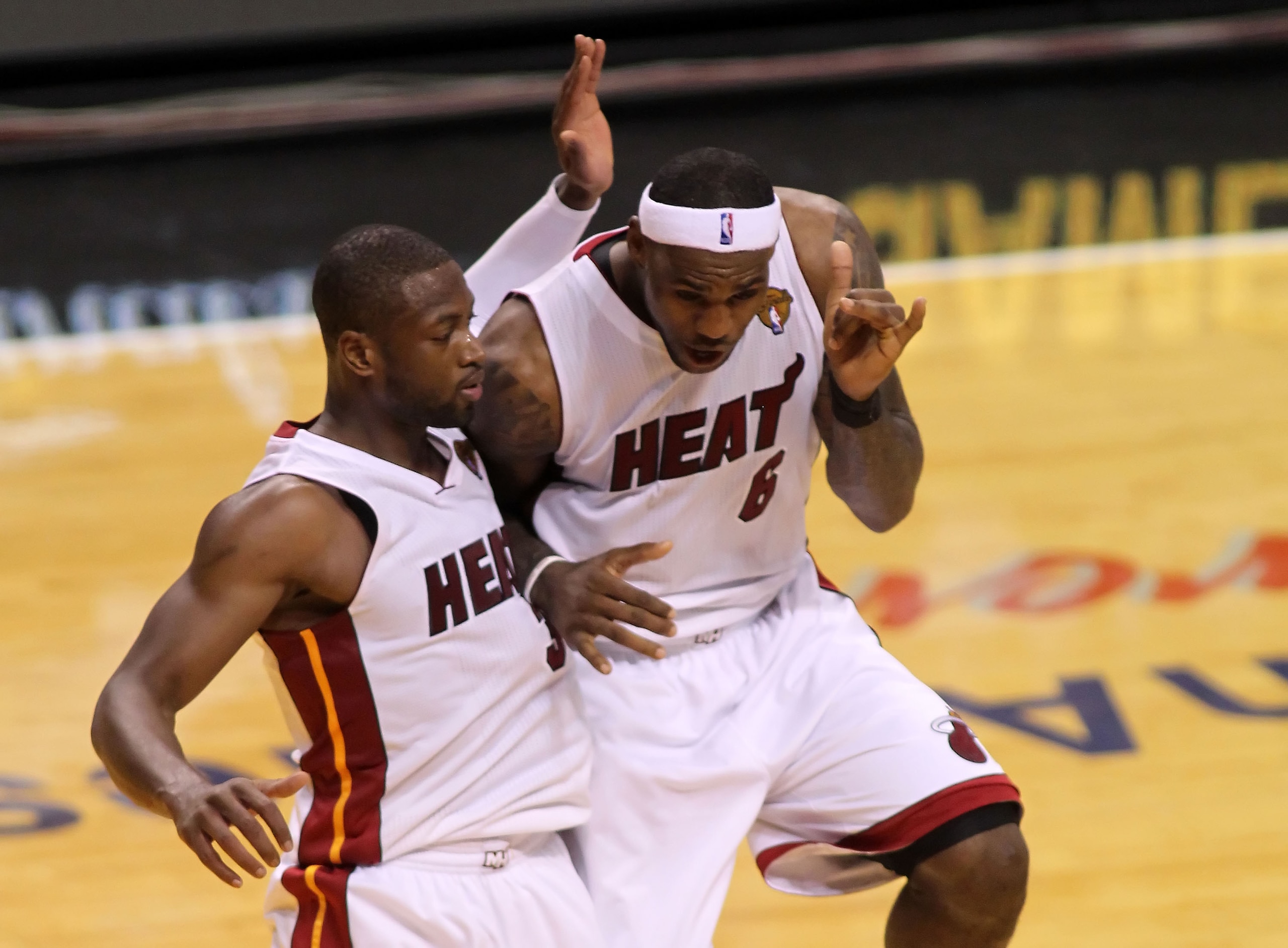 MIAMI, FL - MAY 31:  Dwyane Wade #3 and LeBron James #6 of the Miami Heat react in the fourth quarter while taking on the Dallas Mavericks in Game One of the 2011 NBA Finals at American Airlines Arena on May 31, 2011 in Miami, Florida. NOTE TO USER: User