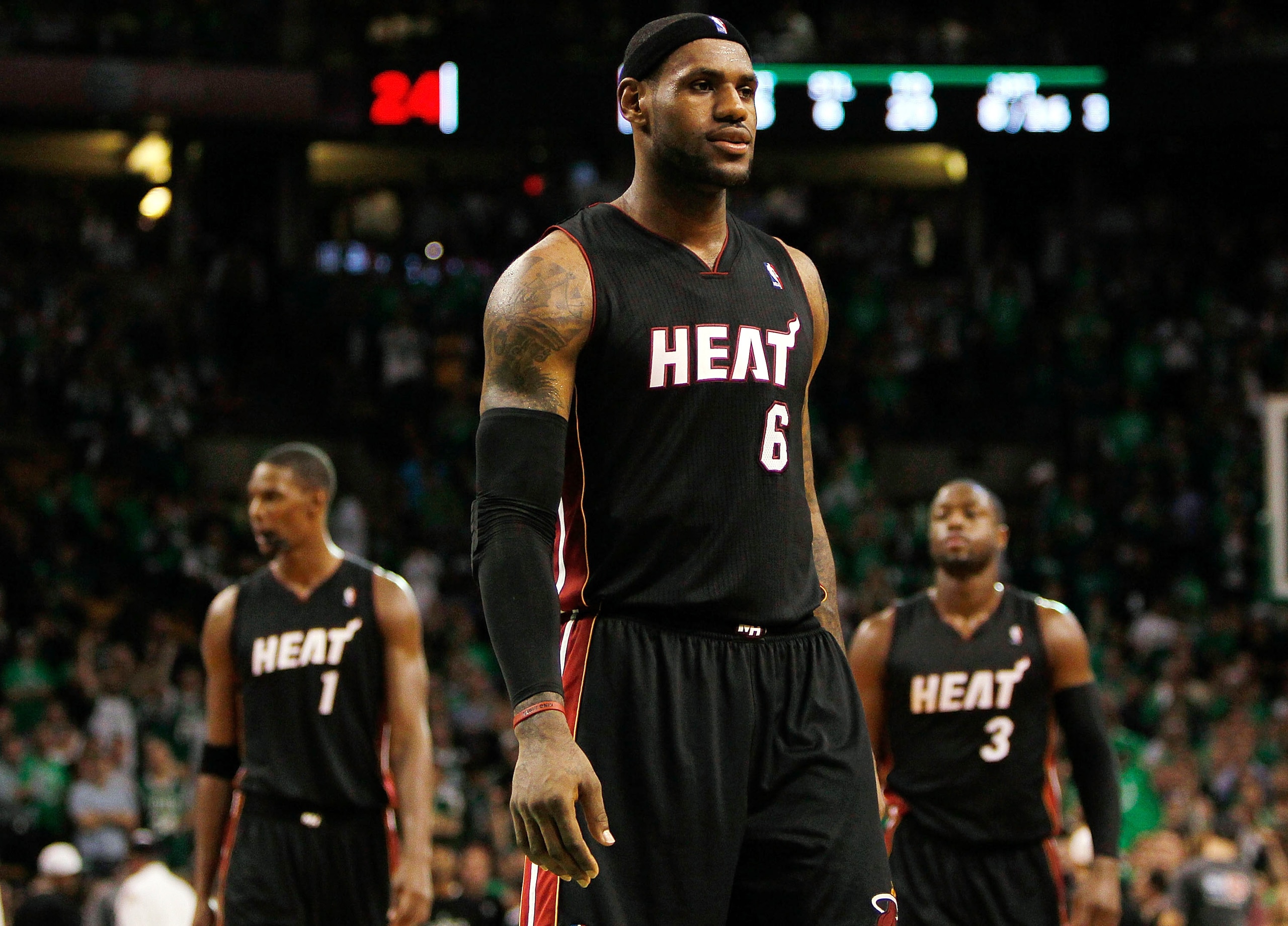 BOSTON, MA - OCTOBER 26: LeBron James #6, Chris Bosh #1 and Dwyane Wade #3 of the Miami Heat walk into position moments before losing to the Boston Celtics, 88-80, at the TD Banknorth Garden on October 26, 2010 in Boston, Massachusetts. NOTE TO USER: User