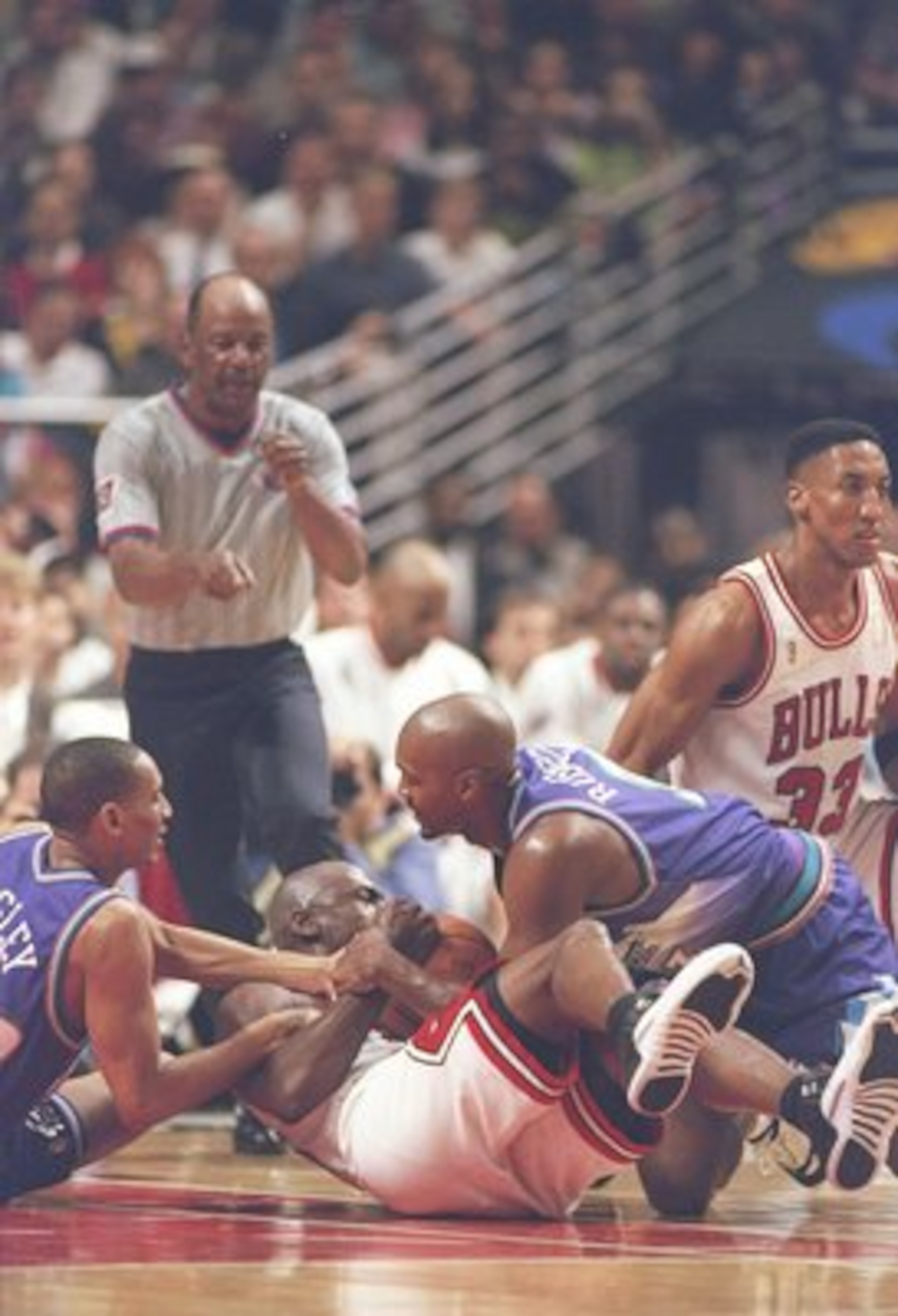 4 Jun 1997: Guard Michael Jordan and Scottie Pippen of the Chicago Bulls and guard Howard Eisley and forward Bryon Russell of the Utah Jazz fight for the ball during a playoff game at the United Center in Chicago, Illinois. The Bulls won the game 97-85. 4 Jun 1997: Guard Michael Jordan and Scottie Pippen of the Chicago Bulls and guard Howard Eisley and forward Bryon Russell of the Utah Jazz fight for the ball during a playoff game at the United Center in Chicago, Illinois. The Bulls won the game 97-85.