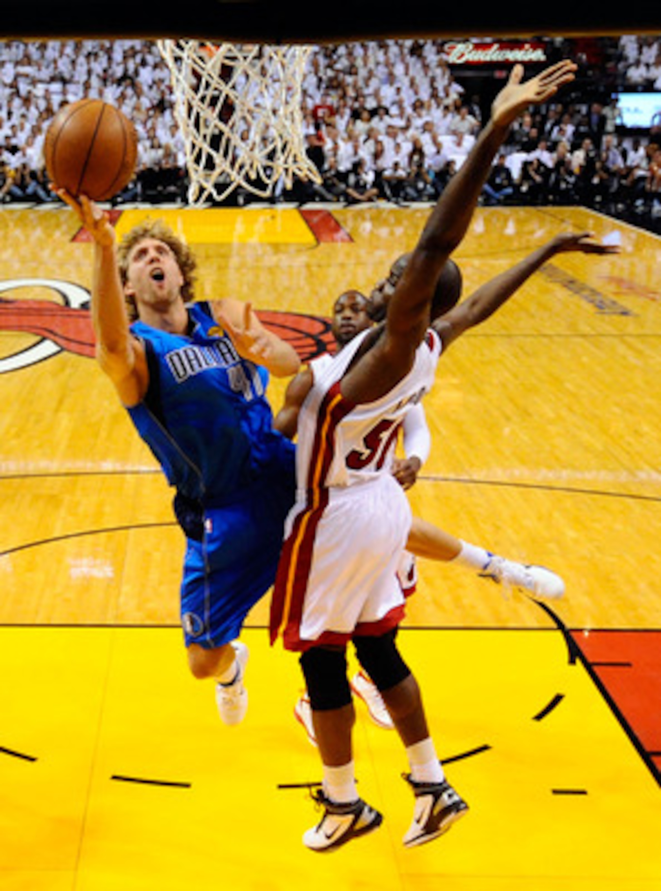 MIAMI, FL - MAY 31:  Dirk Nowitzki #41 of the Dallas Mavericks goes up for a shot against Joel Anthony #50 of the Miami Heat in the first half in Game One of the 2011 NBA Finals at American Airlines Arena on May 31, 2011 in Miami, Florida. NOTE TO USER: U