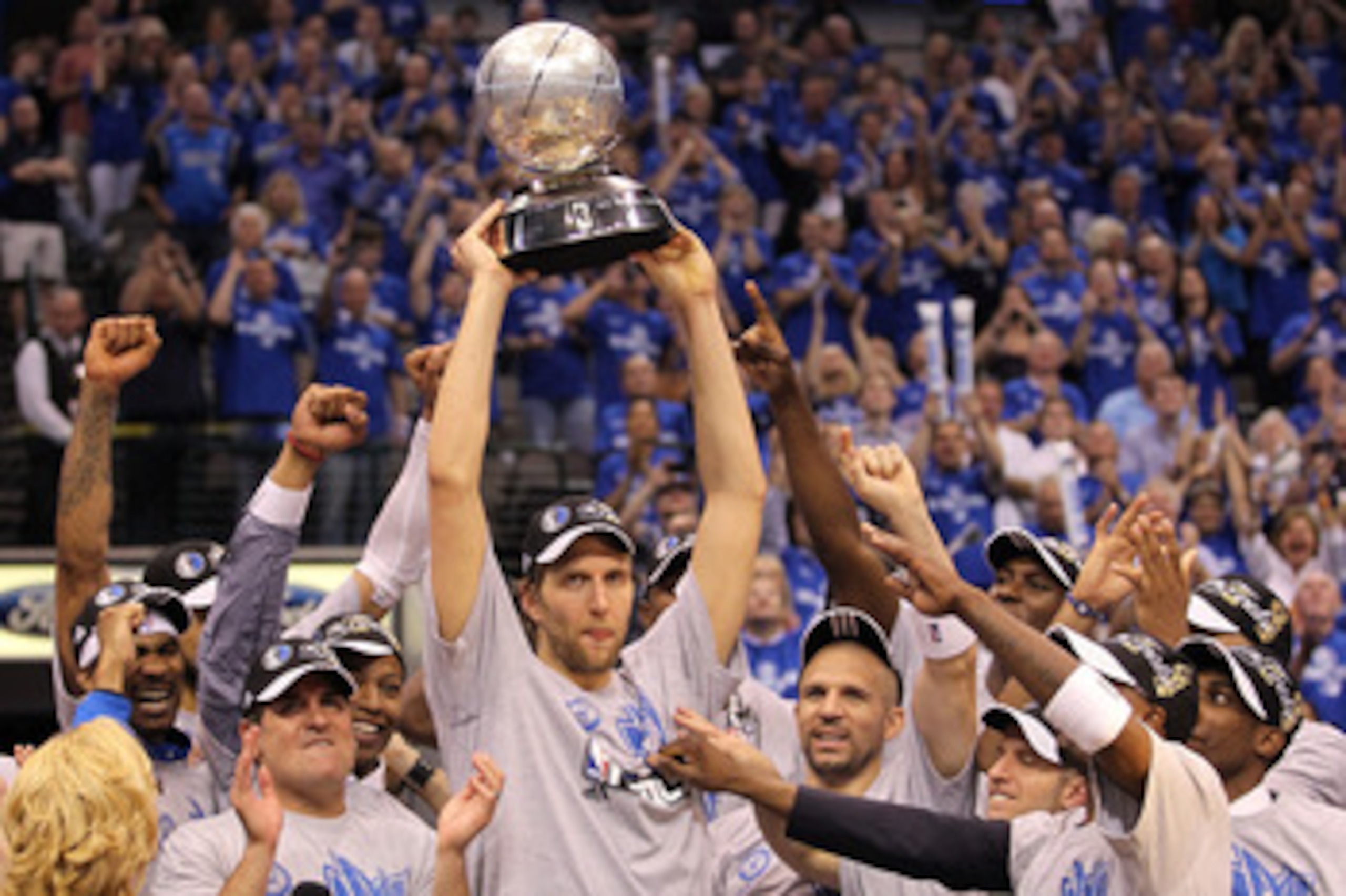DALLAS, TX - MAY 25:  Dirk Nowitzki #41 and the Dallas Mavericks celebrate their 100-96 victory against the Oklahoma City Thunder in Game Five of the Western Conference Finals during the 2011 NBA Playoffs at American Airlines Center on May 25, 2011 in Dal