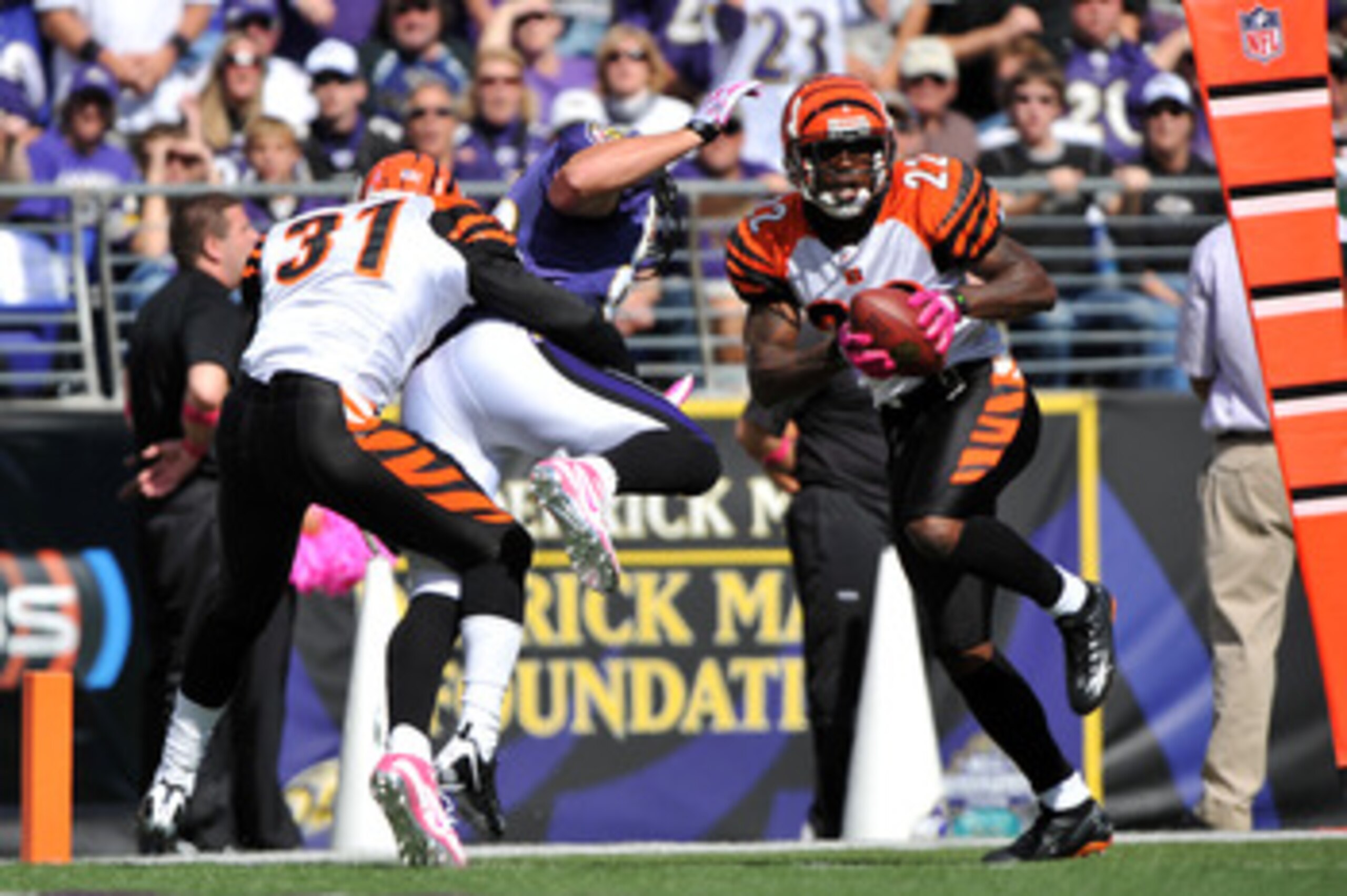 BALTIMORE - OCTOBER 11:  Johnathan Joseph #22 of the Cincinnati Bengals makes an interception near the end zone against the Baltimore Ravens at M&T Bank Stadium on October 11, 2009 in Baltimore, Maryland. The Bengals defeated the Ravens 17-14. (Photo by L