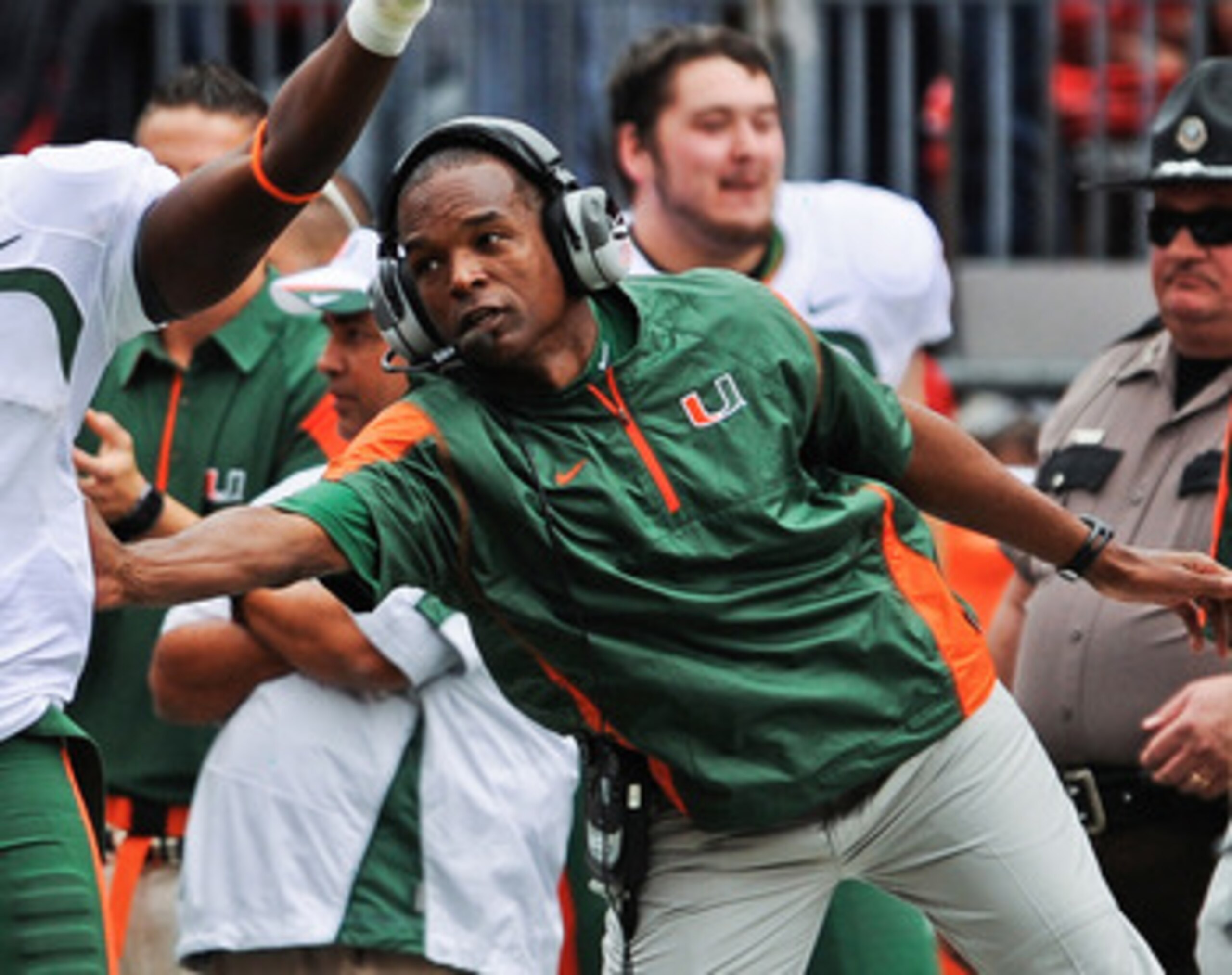 COLUMBUS, OH - SEPTEMBER 11:  Head Coach Randy Shannon of the Miami Hurricanes congratulates Aldarius Johnson #4 of the Hurricanes after a first down catch against the Ohio State Buckeyes at Ohio Stadium on September 11, 2010 in Columbus, Ohio.  (Photo by