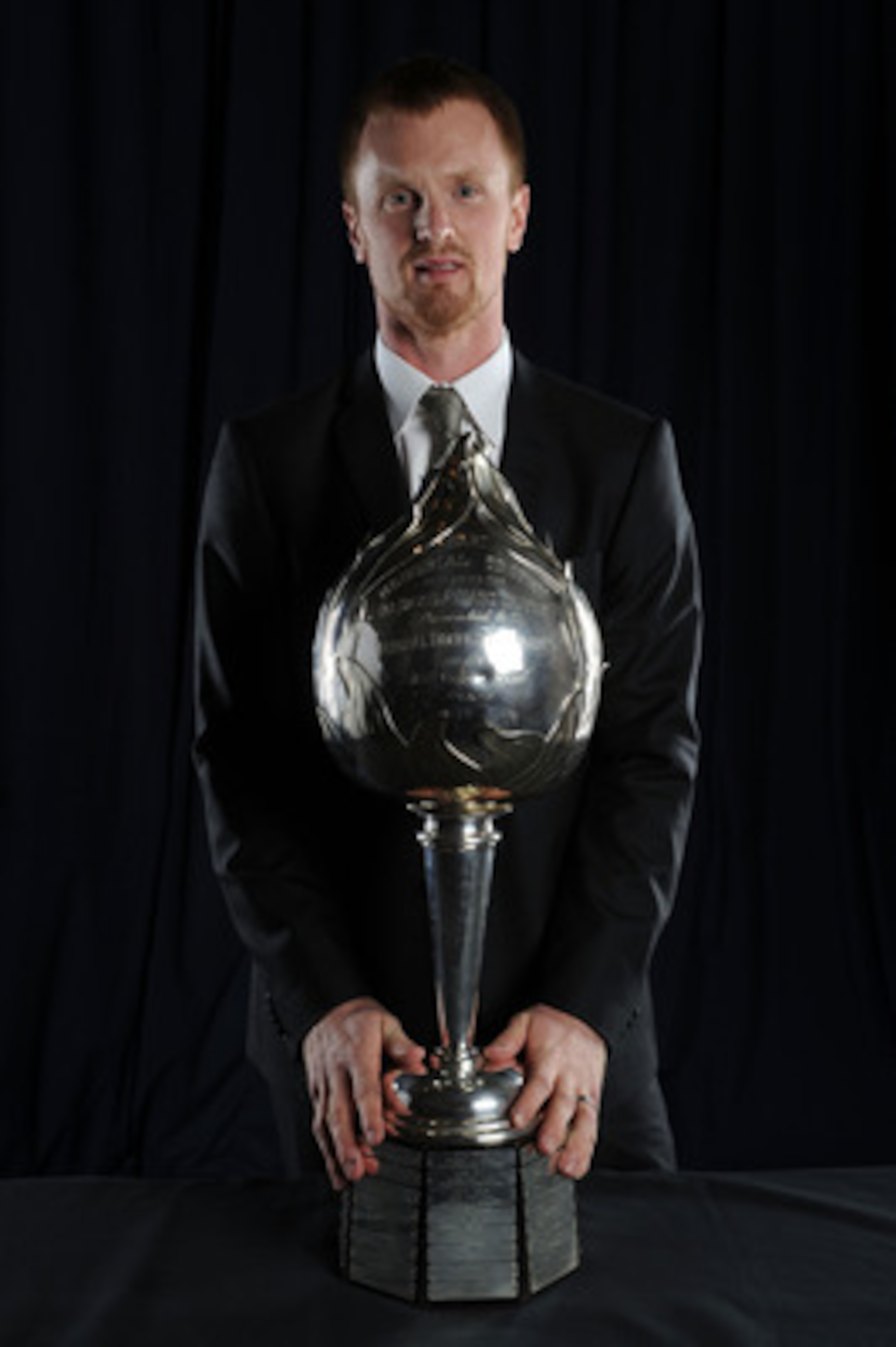 LAS VEGAS - JUNE 23:  Henrik Sedin of the Vancouver Canucks poses for a portrait with the Hart Memorial Trophy during the 2010 NHL Awards at the Palms Casino Resort on June 23, 2010 in Las Vegas, Nevada.  (Photo by Harry How/Getty Images)