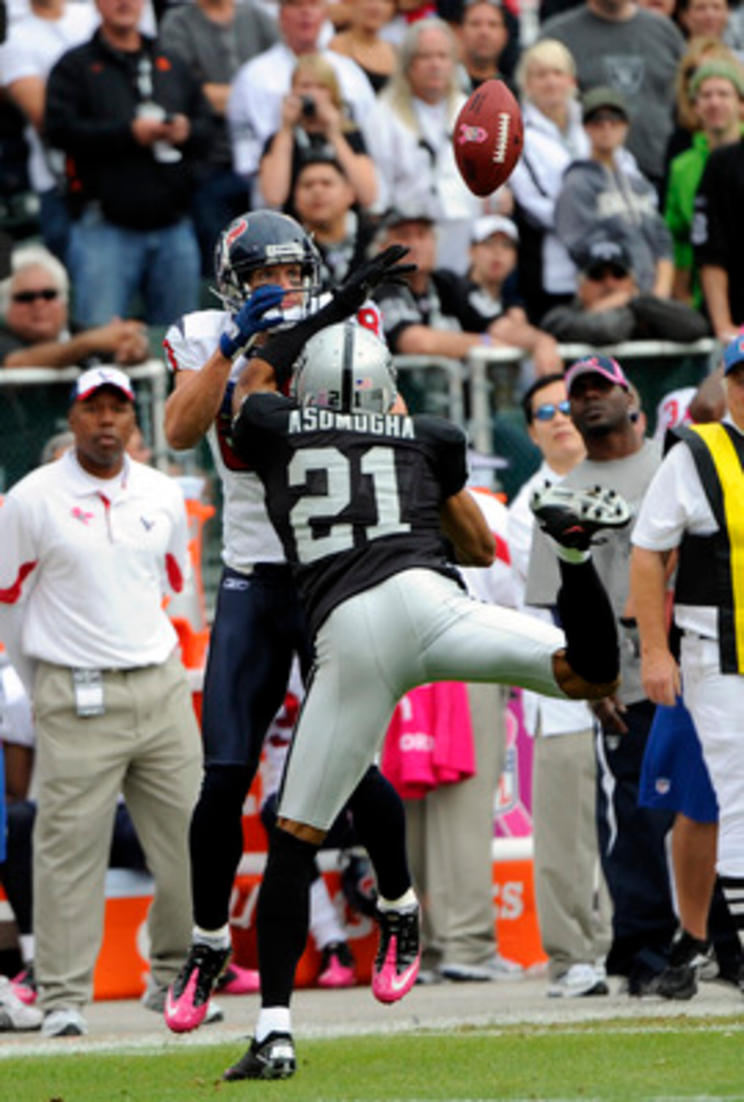 OAKLAND, CA - OCTOBER 3: Defensive back Nnamdi Asomugha #21 of the Oakland Raiders breaks up a pass to wide receiver Kevin Walter #83 of the Houston Texans during an NFL football game October 3, 2010 at The Oakland-Alameda County Coliseum in Oakland, Cal OAKLAND, CA - OCTOBER 3: Defensive back Nnamdi Asomugha #21 of the Oakland Raiders breaks up a pass to wide receiver Kevin Walter #83 of the Houston Texans during an NFL football game October 3, 2010 at The Oakland-Alameda County Coliseum in Oakland, Cal