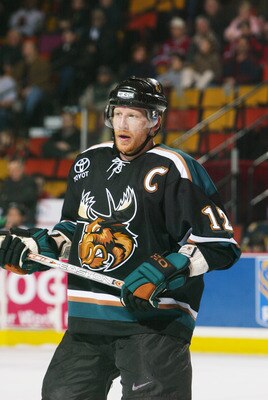 HAMILTON, CANADA - JANUARY 7:  Mike Keane #12 of the Manitoba Moose looks on against the Hamilton Bulldogs during the AHL game on January 7, 2006 at Copps Colliseum in Hamilton, Ontario, Canada.  The Bulldogs won 3-2.  (Photo By Dave Sandford/Getty Images