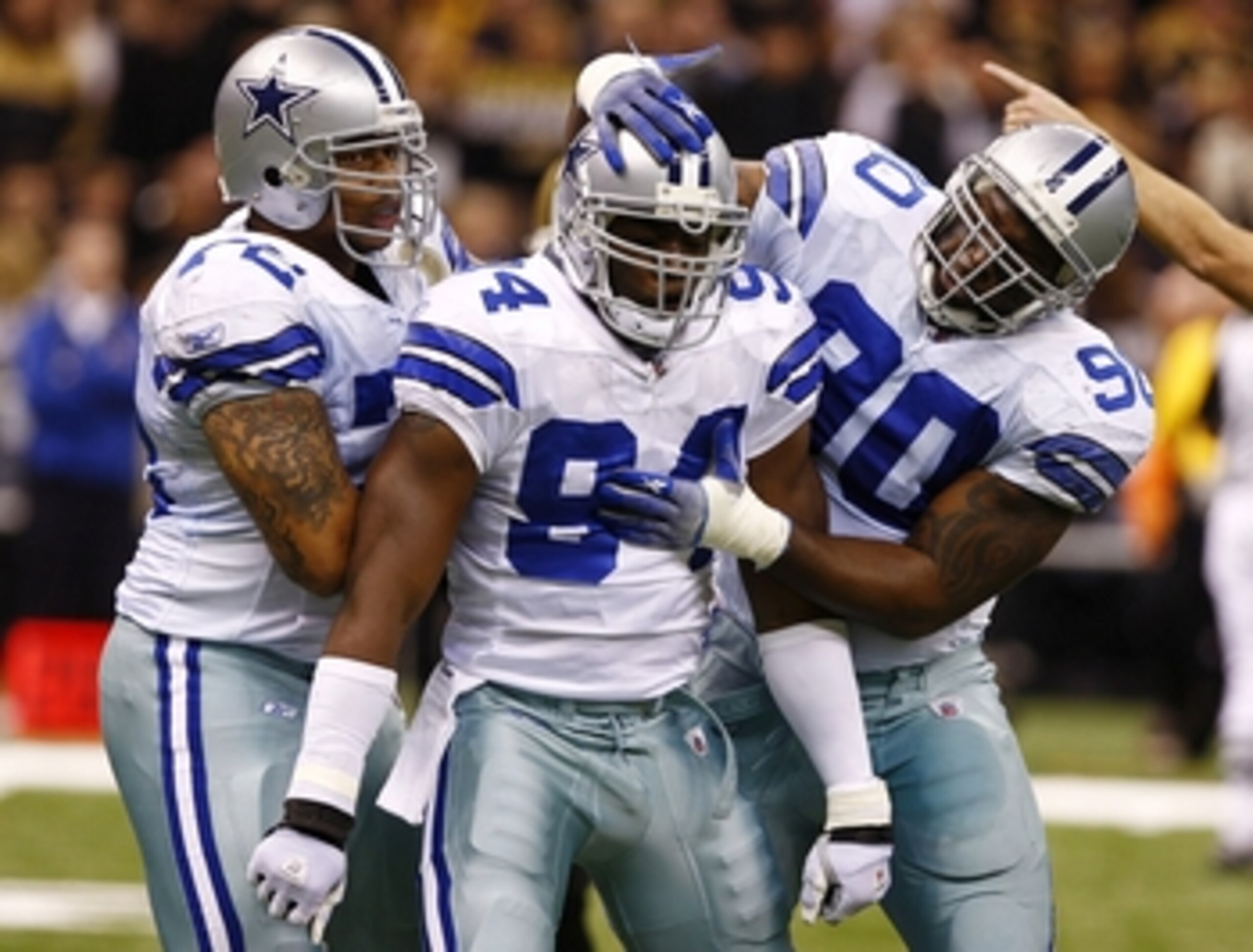 NEW ORLEANS - DECEMBER 19: Linebacker DeMarcus Ware #94 of the Dallas Cowboys celebrates with defensive ends Jay Ratliff (R) #90 and Stephen Bowen (L) #72 after a sack against the New Orleans Saints at the Louisiana Superdome on December 19, 2009 in New NEW ORLEANS - DECEMBER 19: Linebacker DeMarcus Ware #94 of the Dallas Cowboys celebrates with defensive ends Jay Ratliff (R) #90 and Stephen Bowen (L) #72 after a sack against the New Orleans Saints at the Louisiana Superdome on December 19, 2009 in New