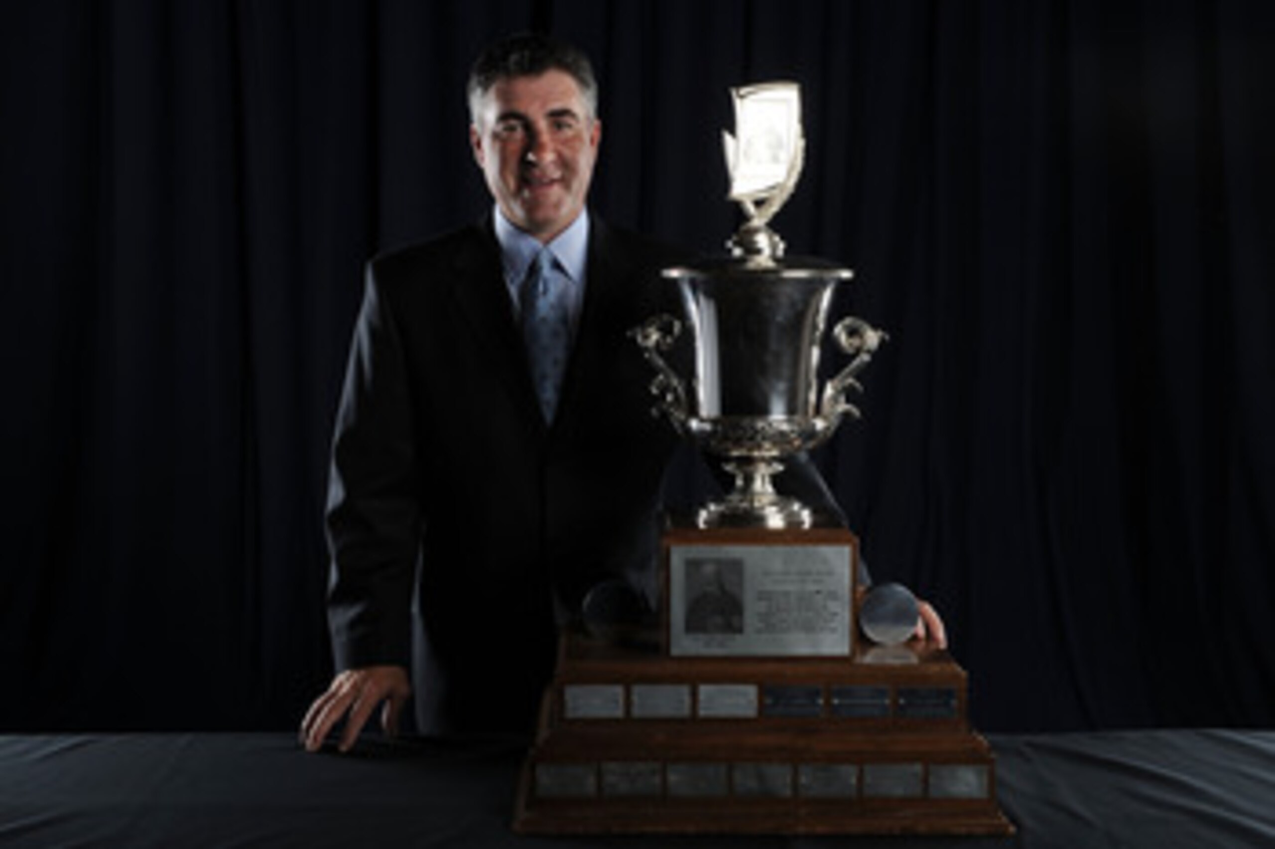 LAS VEGAS - JUNE 23:  Dave Tippett of the Phoenix Coyotes poses for a portrait with the Jack Adams Award during the 2010 NHL Awards at the Palms Casino Resort on June 23, 2010 in Las Vegas, Nevada.  (Photo by Harry How/Getty Images)