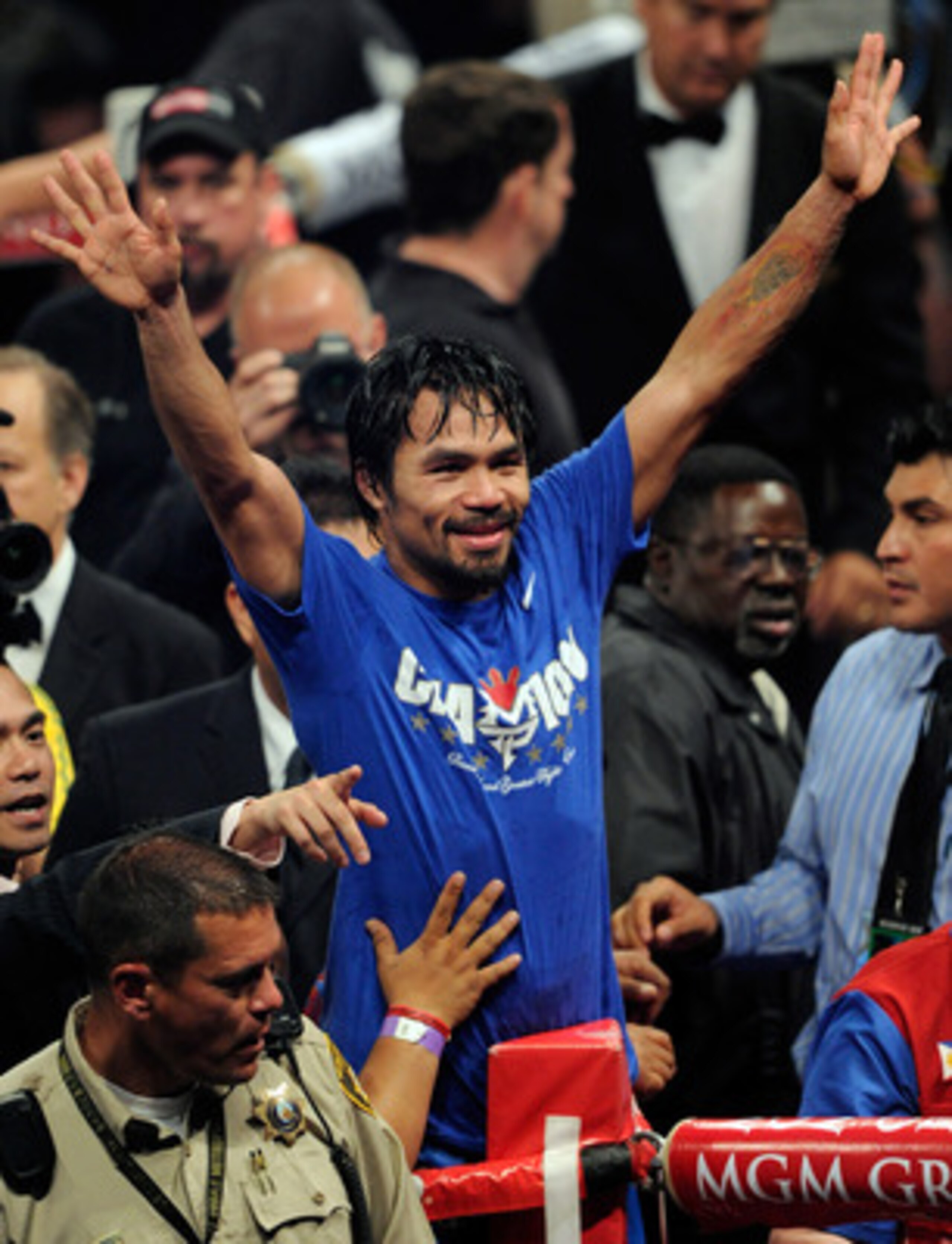 LAS VEGAS, NV - MAY 07:  Manny Pacquiao of the Philippines celebrates after his unanimous decision victory against Shane Mosley in the WBO welterweight title fight at MGM Grand Garden Arena on May 7, 2011 in Las Vegas, Nevada.  (Photo by Ethan Miller/Gett