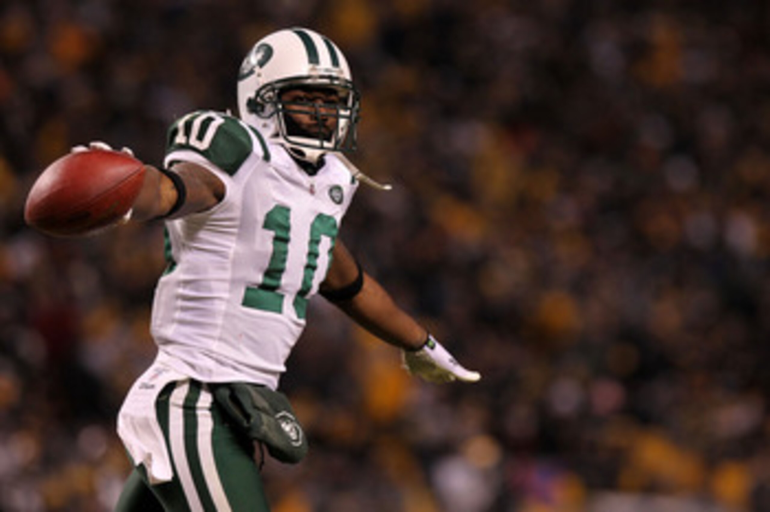 PITTSBURGH, PA - JANUARY 23: Santonio Holmes #10 of the New York Jets celebrates after he scored a third quarter touchdown against the Pittsburgh Steelers during the 2011 AFC Championship game at Heinz Field on January 23, 2011 in Pittsburgh, Pennsylvani PITTSBURGH, PA - JANUARY 23: Santonio Holmes #10 of the New York Jets celebrates after he scored a third quarter touchdown against the Pittsburgh Steelers during the 2011 AFC Championship game at Heinz Field on January 23, 2011 in Pittsburgh, Pennsylvani