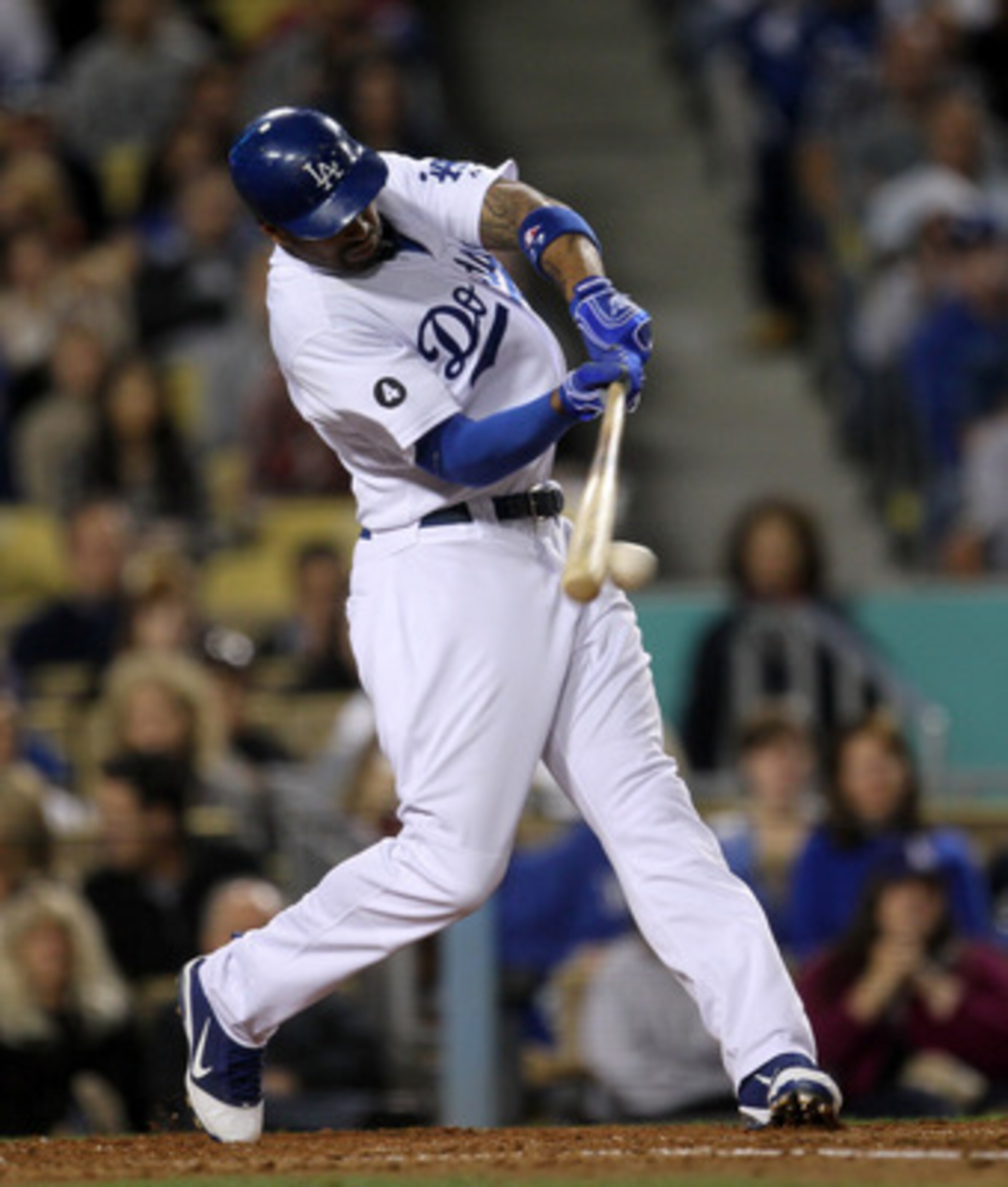 LOS ANGELES - MAY 28: Matt Kemp #27 of the Los Angeles Dodgers hits an RBI double in the third inning against the Florida Marlins on May 28, 2011 at Dodger Stadium in Los Angeles, California.  (Photo by Stephen Dunn/Getty Images)