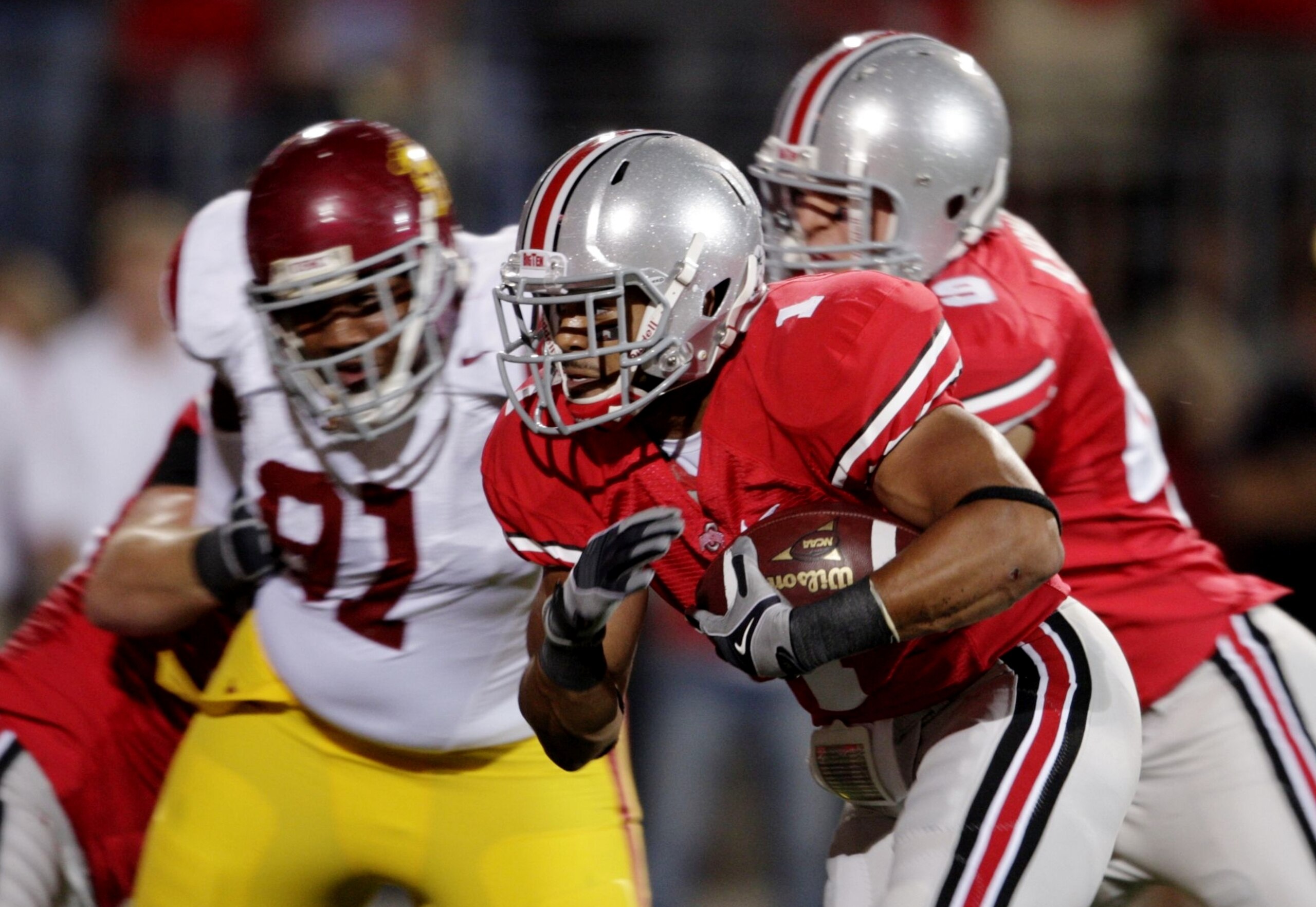 COLUMBUS, OH - SEPTEMBER 12:  Running back Daniel Herron #1 of the Ohio State Buckeyes rushes up the middle for a 2-yard gain during the first quarter of the game against of the USC Trojans at Ohio Stadium on September 12, 2009 in Columbus, Ohio. (Photo b