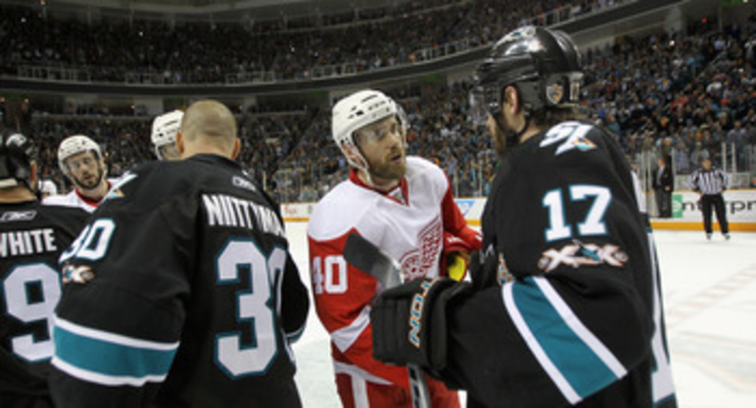 SAN JOSE, CA - MAY 12: Henrik Zetterberg #40 of the Detroit Red Wings shakes hands with Torrey Mitchell #17 of the San Jose Sharks after Game Seven of the Western Conference Semifinals during the 2011 NHL Stanley Cup Playoffs at HP Pavilion on May 12, 20 SAN JOSE, CA - MAY 12: Henrik Zetterberg #40 of the Detroit Red Wings shakes hands with Torrey Mitchell #17 of the San Jose Sharks after Game Seven of the Western Conference Semifinals during the 2011 NHL Stanley Cup Playoffs at HP Pavilion on May 12, 20