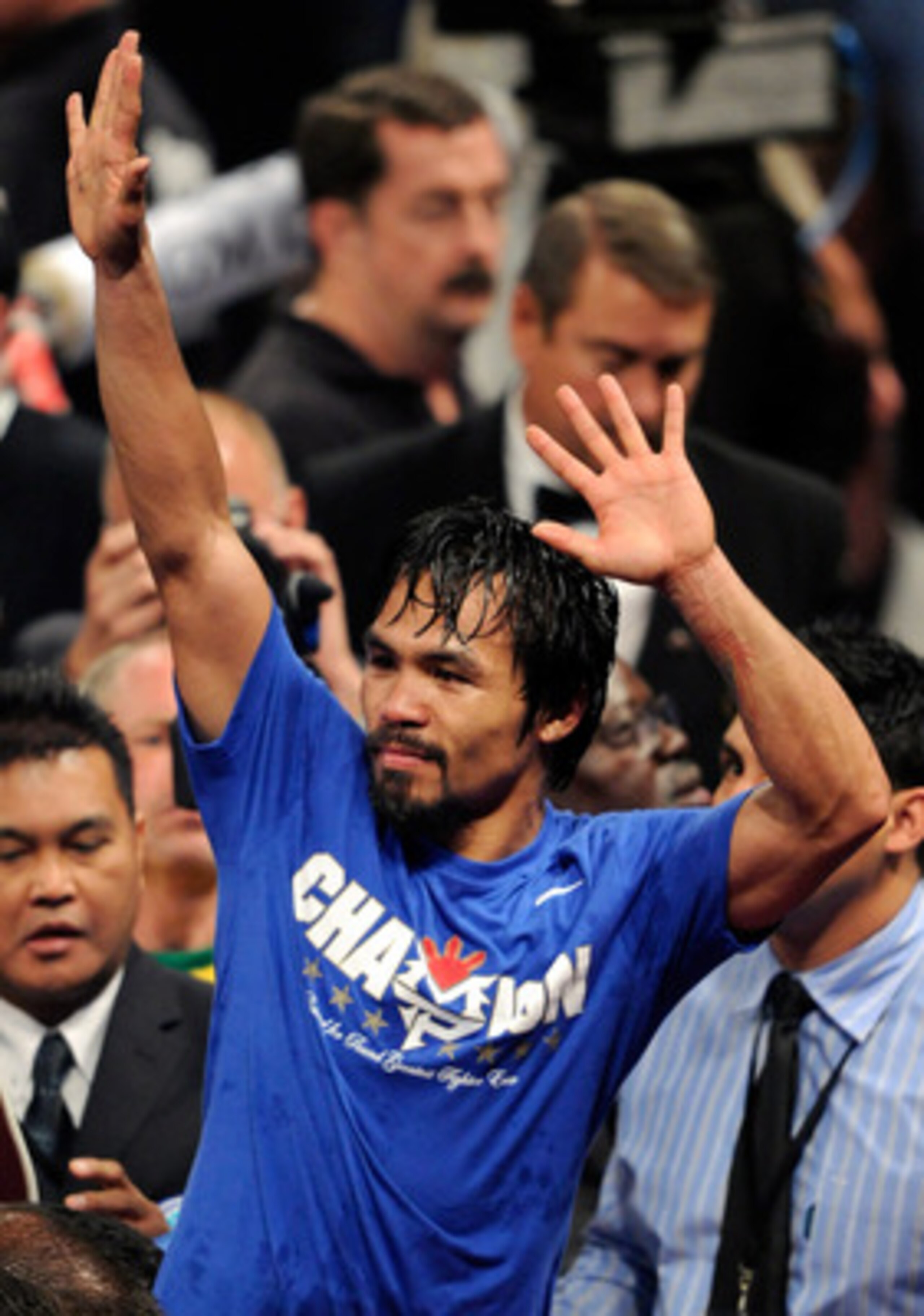 LAS VEGAS, NV - MAY 07:  Boxer Manny Pacquiao reacts at the end of his WBO welterweight title fight against Shane Mosley at the MGM Grand Garden Arena May 7, 2011 in Las Vegas, Nevada. Pacquiao retained his title by unanimous decision.  (Photo by Ethan Mi