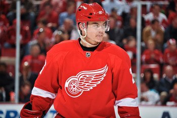 DETROIT - MAY 4: Jiri Hudler #26 of the Detroit Red Wings waits for a face off against the San Jose Sharks in Game Three of the Western Conference Semifinals during the 2011 NHL Stanley Cup Playoffs on May 4, 2011 at Joe Louis Arena in Detroit, Michigan.