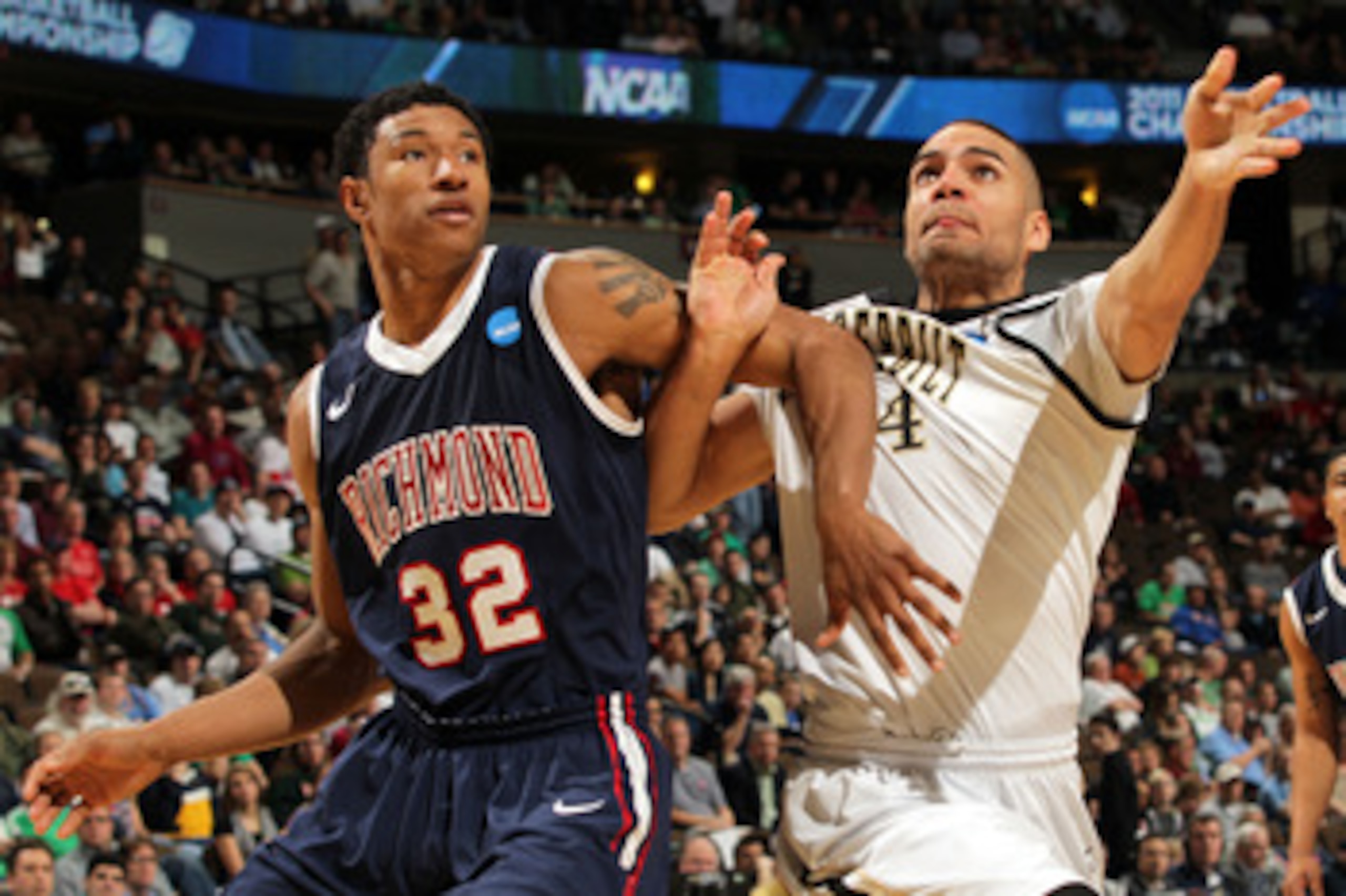 DENVER, CO - MARCH 17: Justin Harper #32 of the Richmond Spiders fights for position against Jeffery Taylor #44 of the Vanderbilt Commodores during the second round of the 2011 NCAA men's basketball tournament at Pepsi Center on March 17, 2011 in Denver, DENVER, CO - MARCH 17: Justin Harper #32 of the Richmond Spiders fights for position against Jeffery Taylor #44 of the Vanderbilt Commodores during the second round of the 2011 NCAA men's basketball tournament at Pepsi Center on March 17, 2011 in Denver,