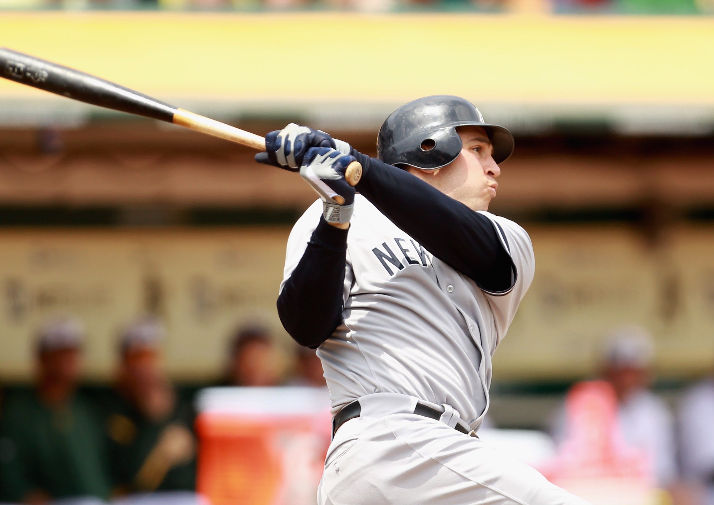 OAKLAND, CA - MAY 30:  Mark Teixeira #25 of the New York Yankees hits a two run home run in the first inning against the Oakland Athletics at Oakland-Alameda County Coliseum on May 30, 2011 in Oakland, California.  (Photo by Ezra Shaw/Getty Images)