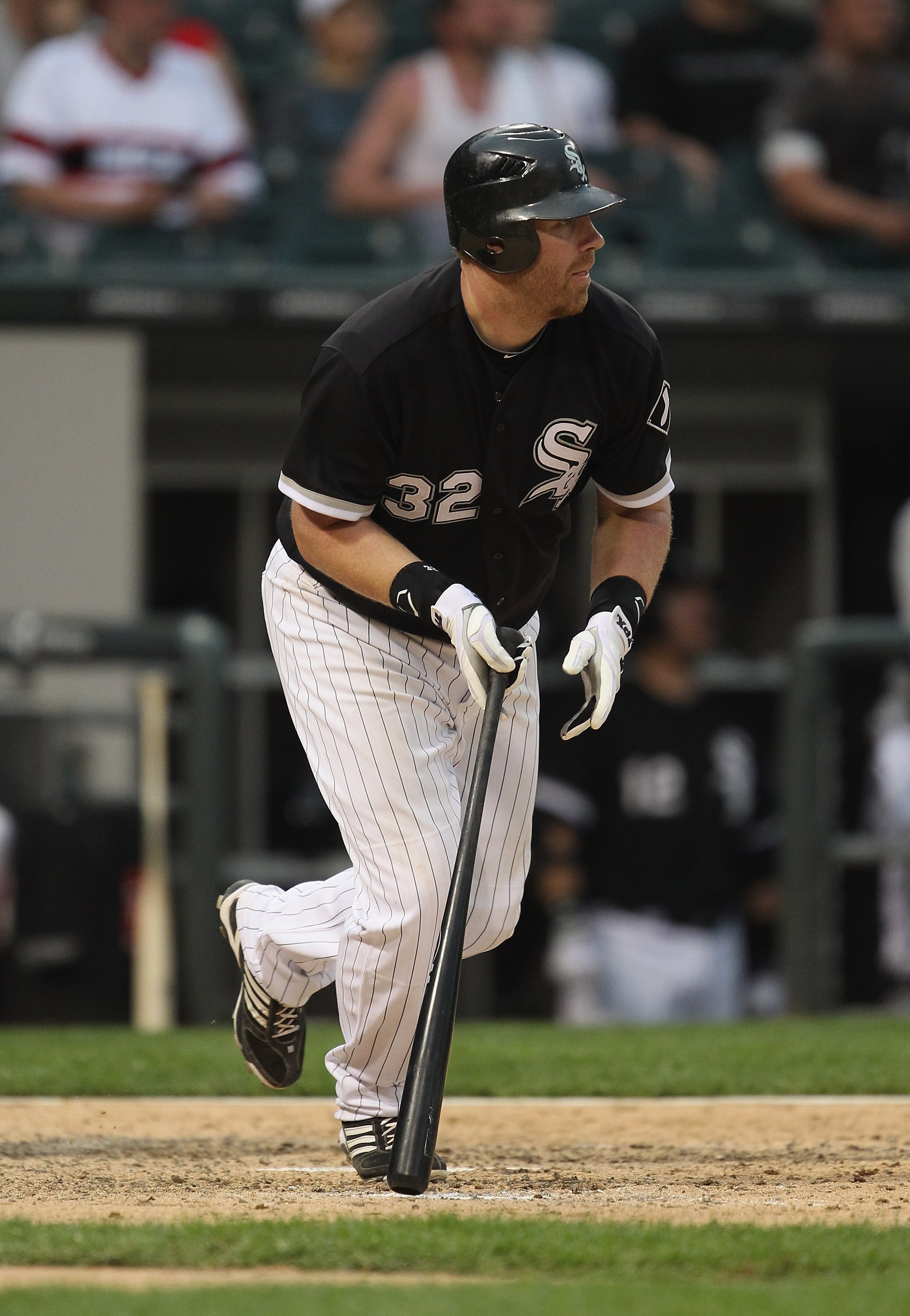 CHICAGO, IL - MAY 22:  Adam Dunn #32 of the Chicago White Sox hits a run-scoring single in the 8th inning against the Los Angeles Dodgers at U.S. Cellular Field on May 22, 2011 in Chicago, Illinois. The White Sox defeated the Dodgers 8-3.  (Photo by Jonat