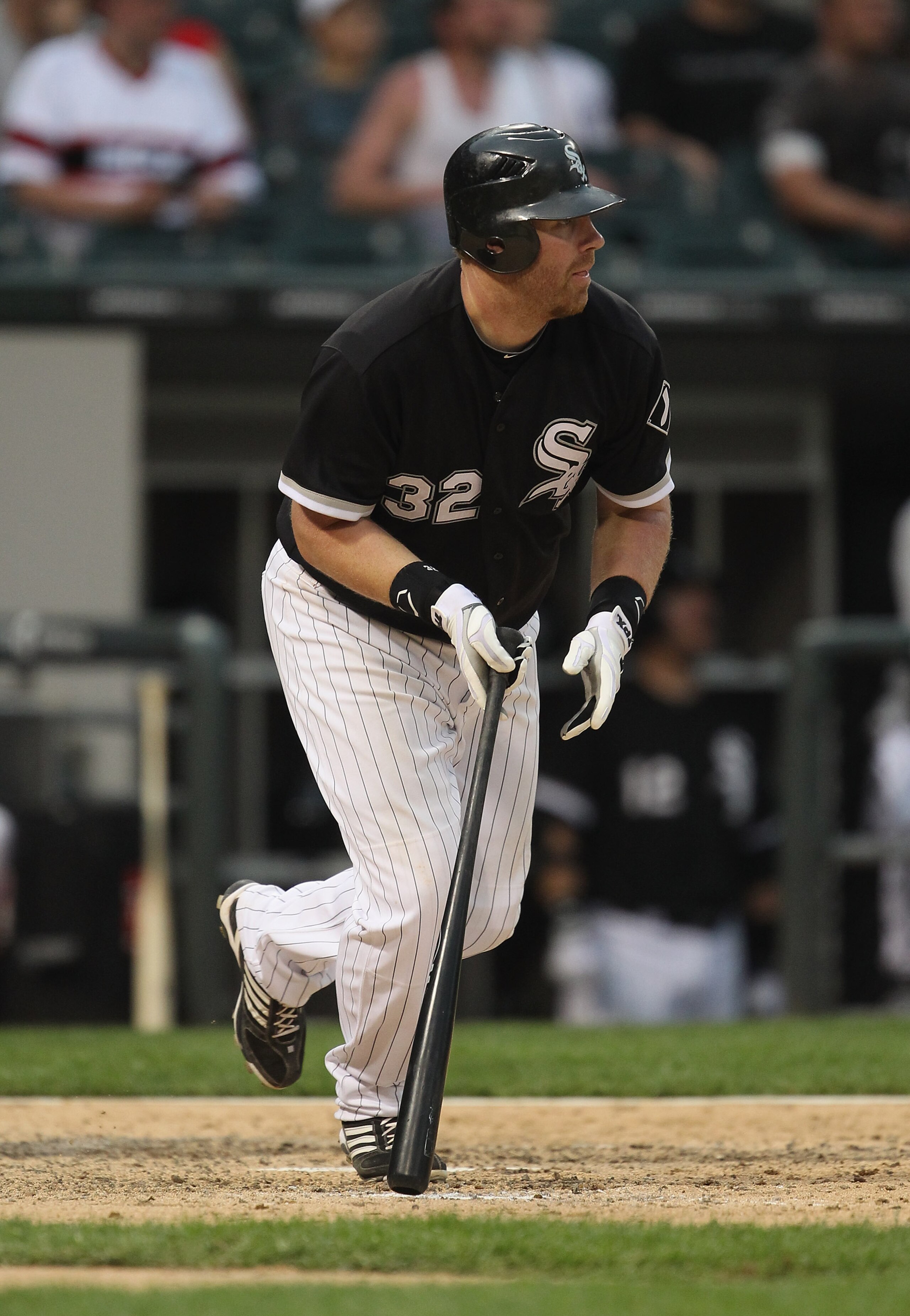 CHICAGO, IL - MAY 22:  Adam Dunn #32 of the Chicago White Sox hits a run-scoring single in the 8th inning against the Los Angeles Dodgers at U.S. Cellular Field on May 22, 2011 in Chicago, Illinois. The White Sox defeated the Dodgers 8-3.  (Photo by Jonat