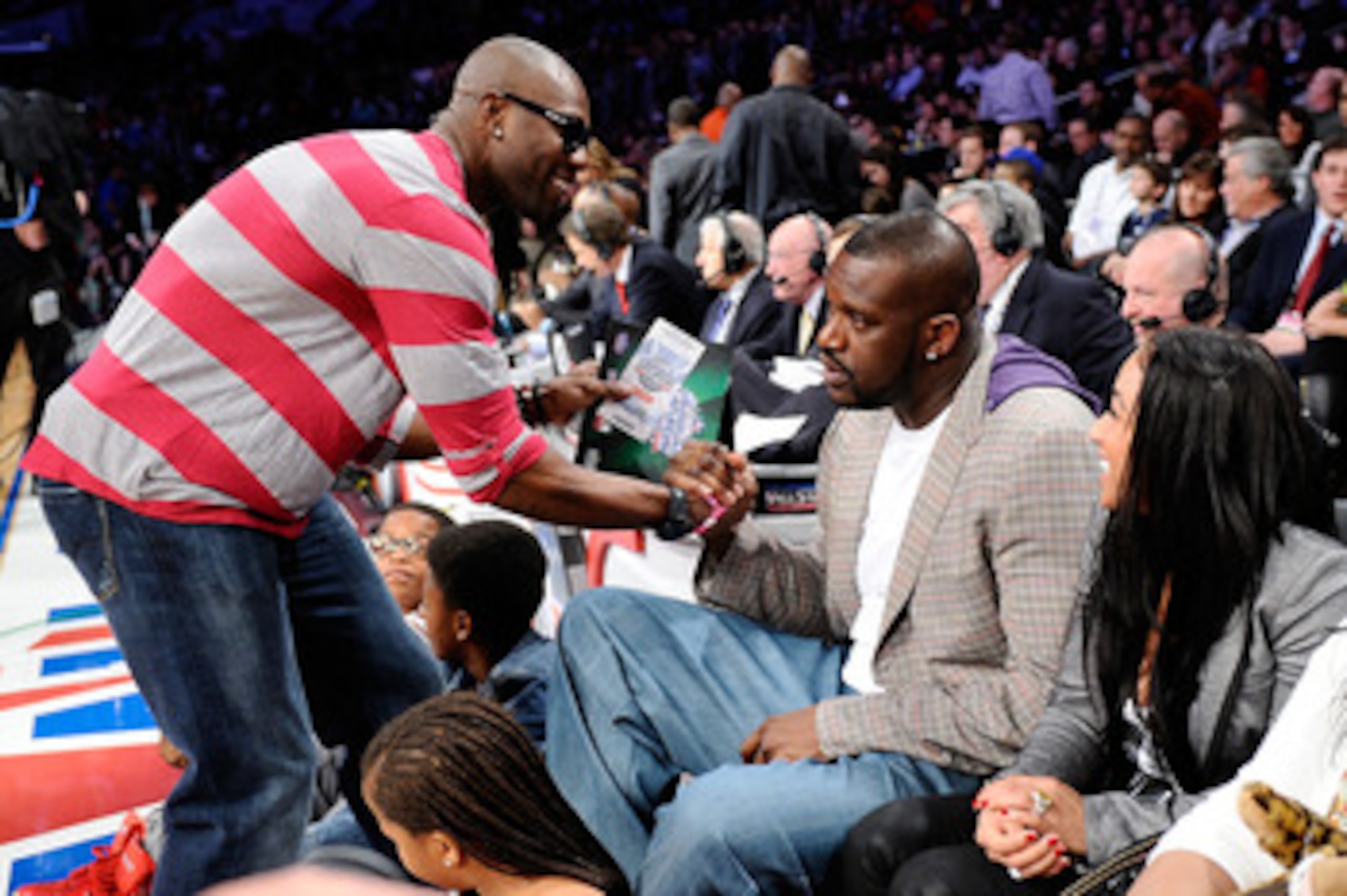 LOS ANGELES, CA - FEBRUARY 19: NFL player Terrell Owens shakes hands with Shaquille O'Neal of the Boston Celtics as they attend NBA All-Star Saturday night presented by State Farm at Staples Center on February 19, 2011 in Los Angeles, California. NOTE T LOS ANGELES, CA - FEBRUARY 19: NFL player Terrell Owens shakes hands with Shaquille O'Neal of the Boston Celtics as they attend NBA All-Star Saturday night presented by State Farm at Staples Center on February 19, 2011 in Los Angeles, California. NOTE T