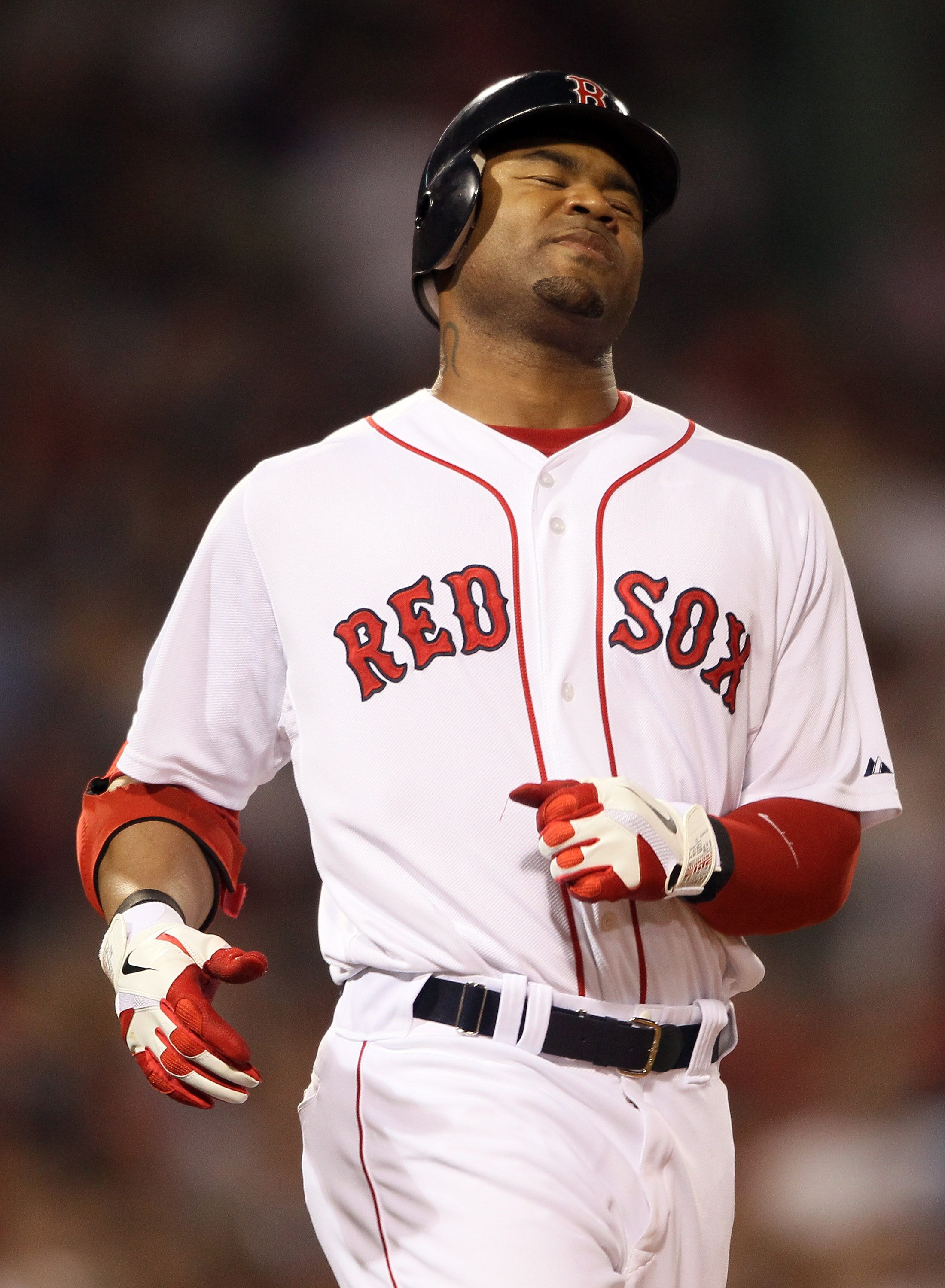 BOSTON, MA - MAY 30:  Carl Crawford #13 of the Boston Red Sox reacts after his hit was caught in the sixth inning against the Chicago White Sox on May 30, 2011 at Fenway Park in Boston, Massachusetts.  (Photo by Elsa/Getty Images)