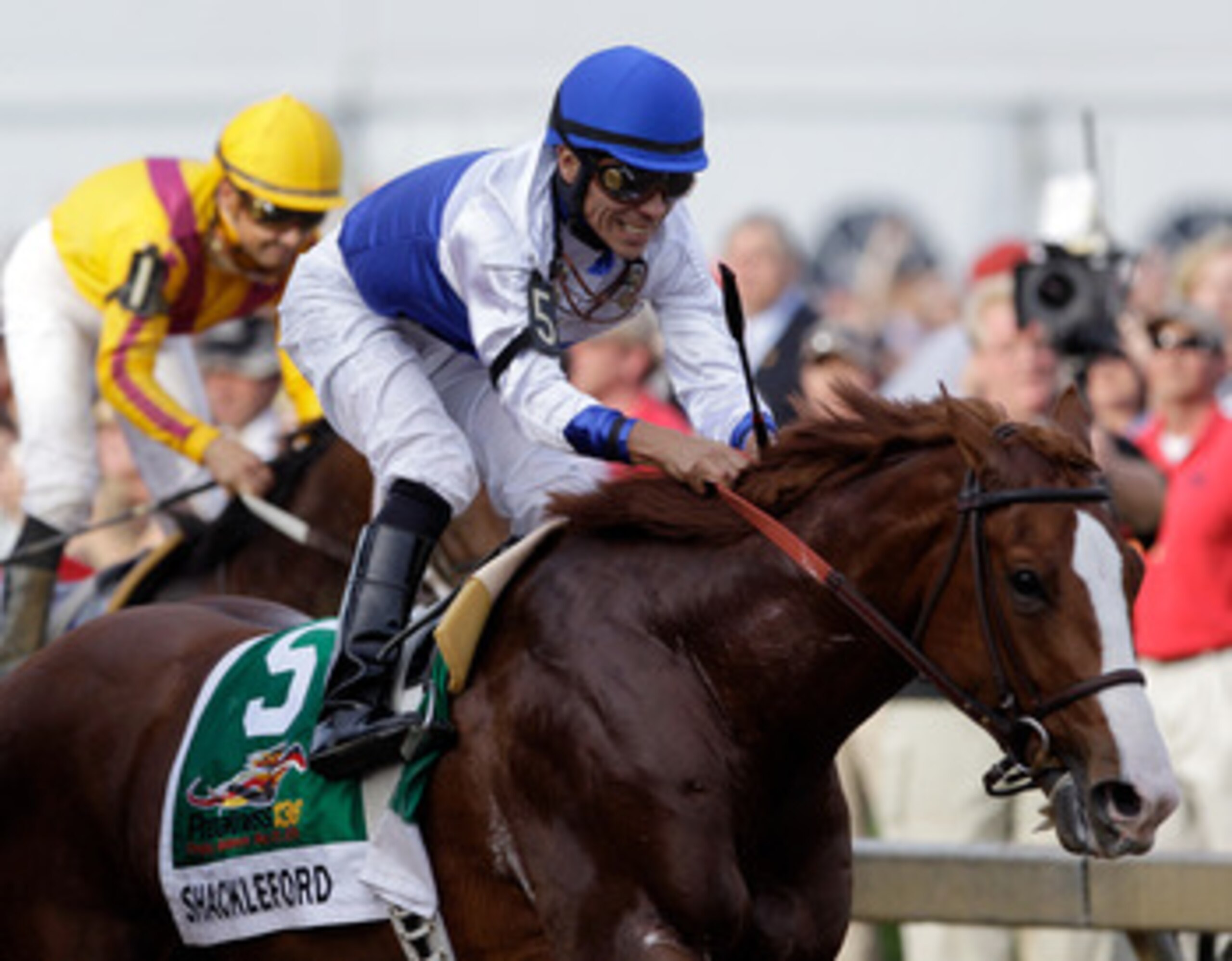 BALTIMORE, MD - MAY 21: Jockey Jesus Castanon smiles after crossing the finish line aboard Shackleford #5 to win the 136th running of the Preakness Stakes at Pimlico Race Course on May 21, 2011 in Baltimore, Maryland. (Photo by Rob Carr/Getty Images) BALTIMORE, MD - MAY 21: Jockey Jesus Castanon smiles after crossing the finish line aboard Shackleford #5 to win the 136th running of the Preakness Stakes at Pimlico Race Course on May 21, 2011 in Baltimore, Maryland. (Photo by Rob Carr/Getty Images)