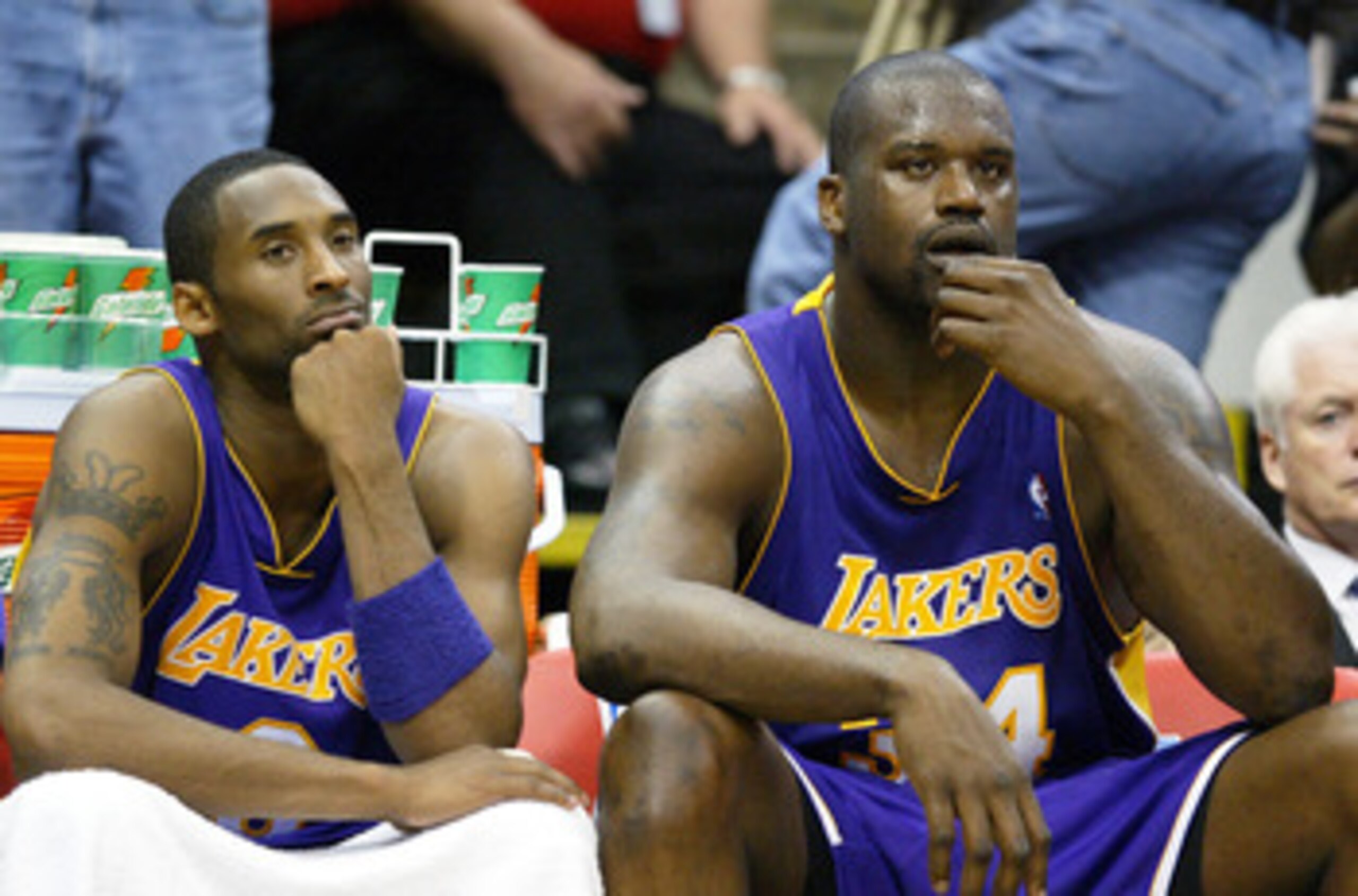 MINNEAPOLIS - MAY 23:  Kobe Bryant #8 and Shaquille O'Neal #34 of the Los Angeles Lakers look on in the second half of Game two of the Western Conference Finals against the Minnesota Timberwolves during the 2004 NBA Playoffs on May 23, 2004 at Target Cent