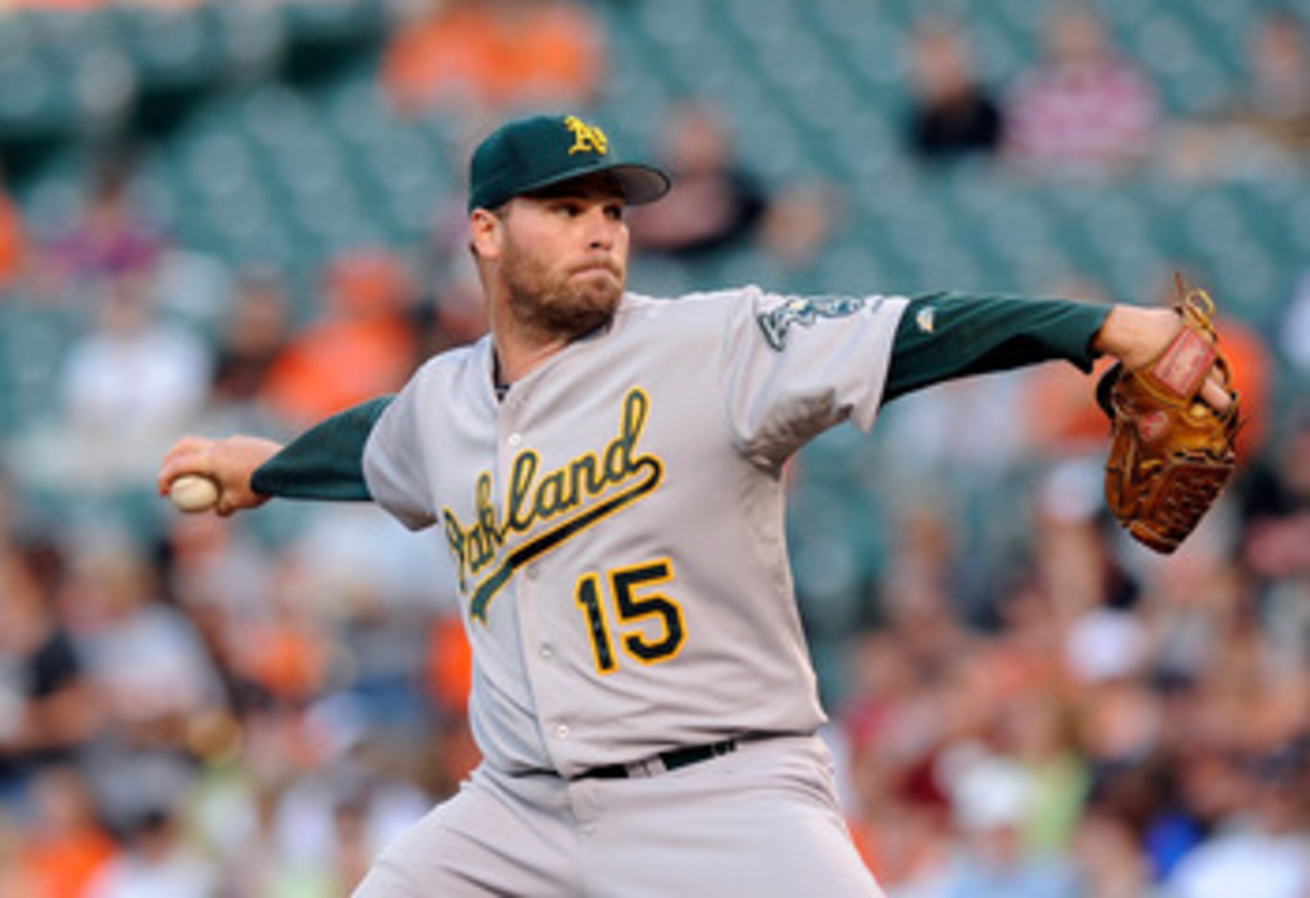 BALTIMORE - JUNE 30:  Ben Sheets #15 of the Oakland Athletics pitches against the Baltimore Orioles at Camden Yards on June 30, 2010 in Baltimore, Maryland.  (Photo by Greg Fiume/Getty Images)