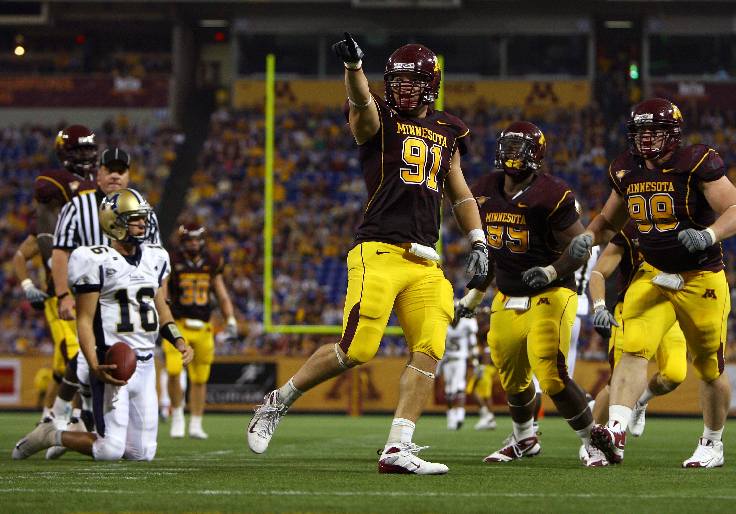 MINNEAPOLIS - SEPTEMBER 13:  Willie VanDeSteeg #91 of the Minnesota Golden Gophers celebrates after sacking Montana State Bobcats' quarterback Mark Iddins #16 in the third quarter at the Metrodome on September 13, 2008 in Minneapolis, Minnesota. Minnesota