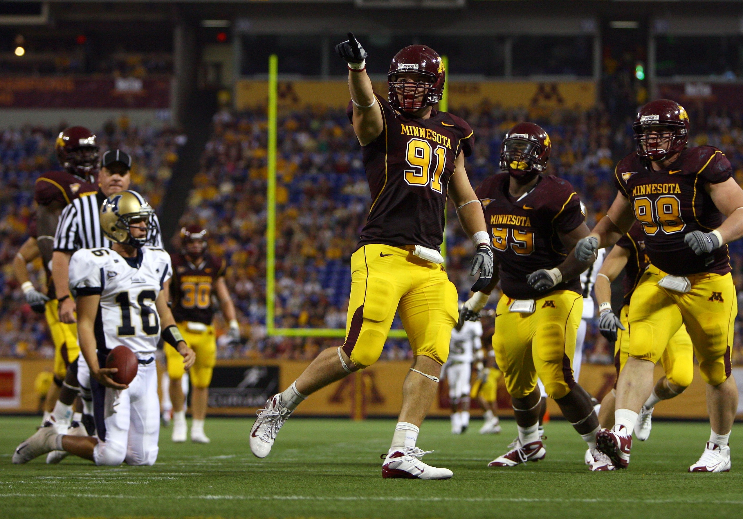 MINNEAPOLIS - SEPTEMBER 13: Willie VanDeSteeg #91 of the Minnesota Golden Gophers celebrates after sacking Montana State Bobcats' quarterback Mark Iddins #16 in the third quarter at the Metrodome on September 13, 2008 in Minneapolis, Minnesota. Minnesota MINNEAPOLIS - SEPTEMBER 13: Willie VanDeSteeg #91 of the Minnesota Golden Gophers celebrates after sacking Montana State Bobcats' quarterback Mark Iddins #16 in the third quarter at the Metrodome on September 13, 2008 in Minneapolis, Minnesota. Minnesota