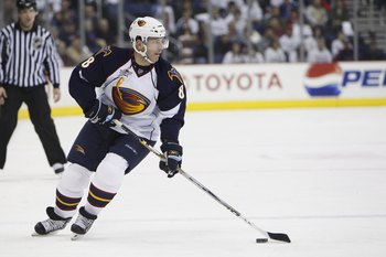COLUMBUS, OH - DECEMBER 26:  Mark Recchi #8 of the Atlanta Thrashers skates with the puck against the Columbus Blue Jackets on December 26, 2007 at Nationwide Arena in Columbus, Ohio. (Photo by Gregory Shamus/Getty Images)