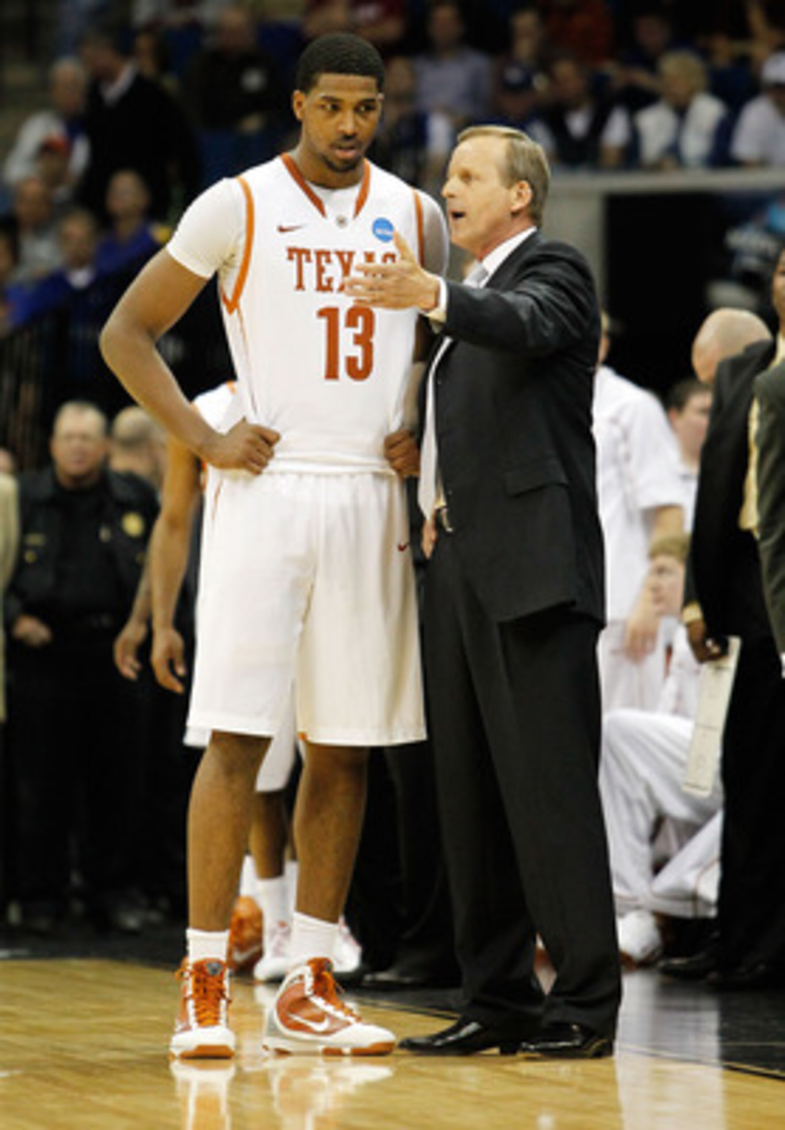 TULSA, OK - MARCH 18:  Head coach Rick Barnes of the Texas Longhorns speaks with Tristan Thompson #13 during the second round game against the Oakland Golden Grizzlies in the 2011 NCAA men's basketball tournament at BOK Center on March 18, 2011 in Tulsa, 