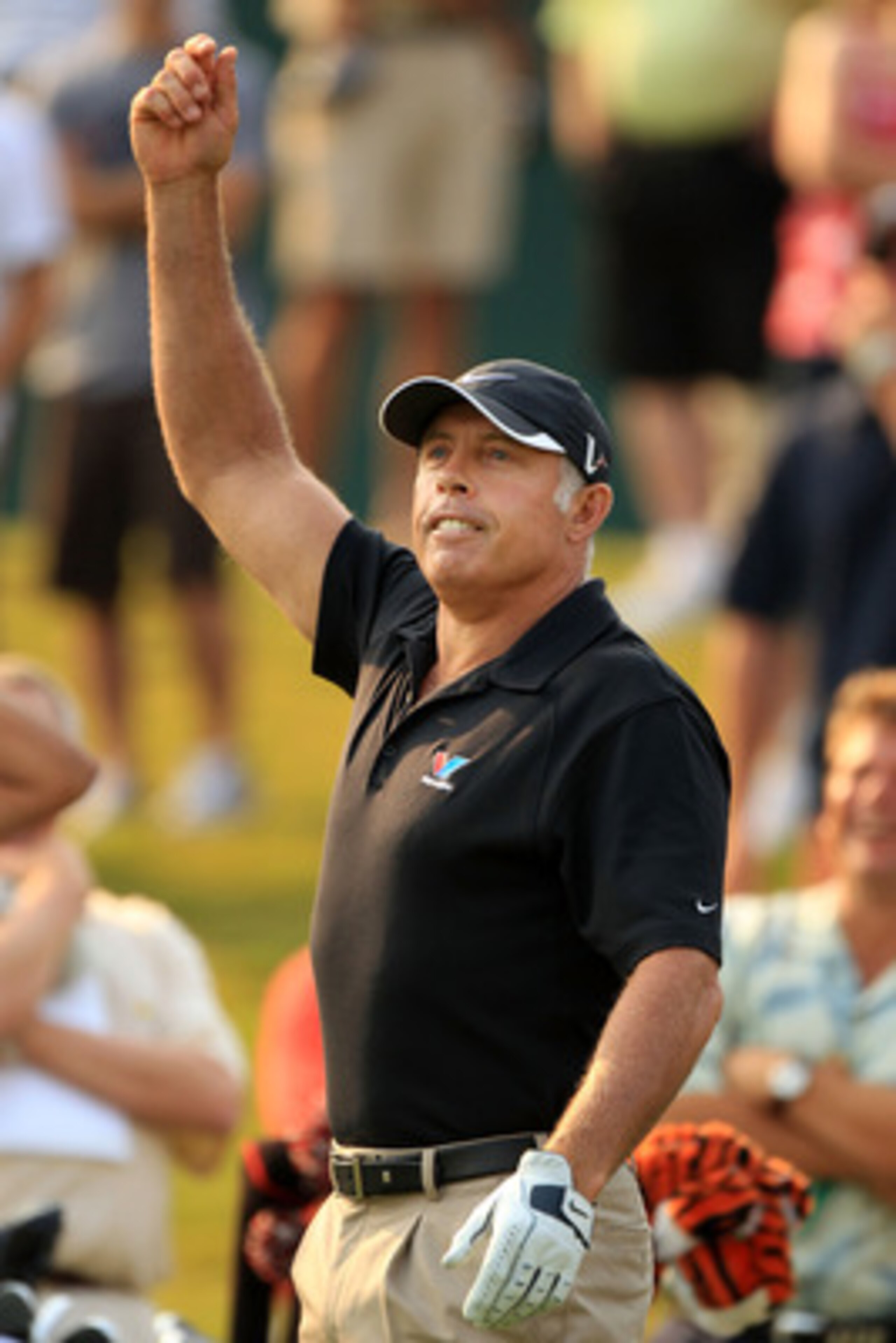 PONTE VEDRA BEACH, FL - MAY 11:  Caddie Steve Williams tosses his club after hitting a shot on the 17th hole for the 'Caddie Challenge' during a practice round prior to the start of THE PLAYERS Championship held at THE PLAYERS Stadium course at TPC Sawgra