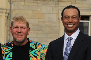 ST ANDREWS, SCOTLAND - JULY 13:  John Daly and Tiger Woods pose for a photo prior to the past champions dinner before the 139th Open Championship on the Old Course, St Andrews on July 13, 2010 in St Andrews, Scotland.  (Photo by David Cannon/Getty Images)