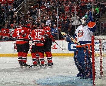 NEWARK, NJ - MARCH 30: Jacob Josefson #16 of the New Jersey Devils scores at 3:23 of the second period against Rick DiPietro #39 of the New York Islanders at the Prudential Center on March 30, 2011 in Newark, New Jersey.  (Photo by Bruce Bennett/Getty Ima