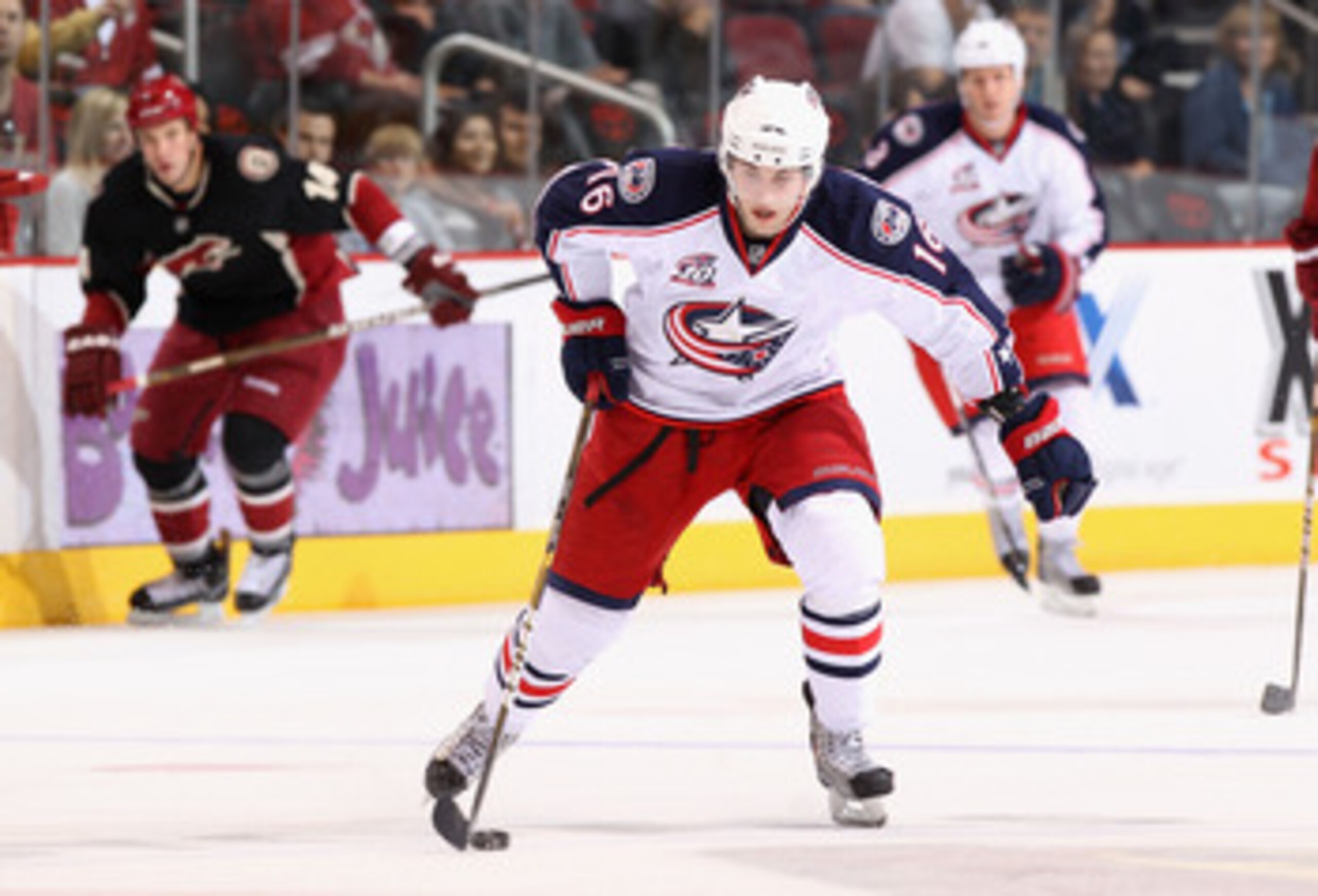 GLENDALE, AZ - MARCH 24:  Derick Brassard #16 of the Columbus Blue Jackets skates with the puck during the NHL game against the Phoenix Coyotes at Jobing.com Arena on March 24, 2011 in Glendale, Arizona.  The Coyotes defeated the Blue Jackets 3-0.  (Photo