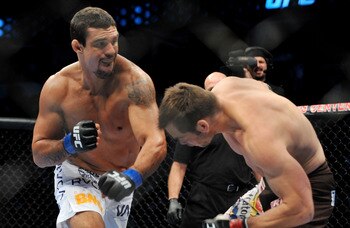 DALLAS - SEPTEMBER 19:  UFC fighter Vitor Belfort  (L) battles UFC fighter Rich Franklin (R) during their Catch weight bout at UFC 103: Franklin vs. Belfort at the American Airlines Center on September 19, 2009 in Dallas, Texas.  (Photo by Jon Kopaloff/Ge