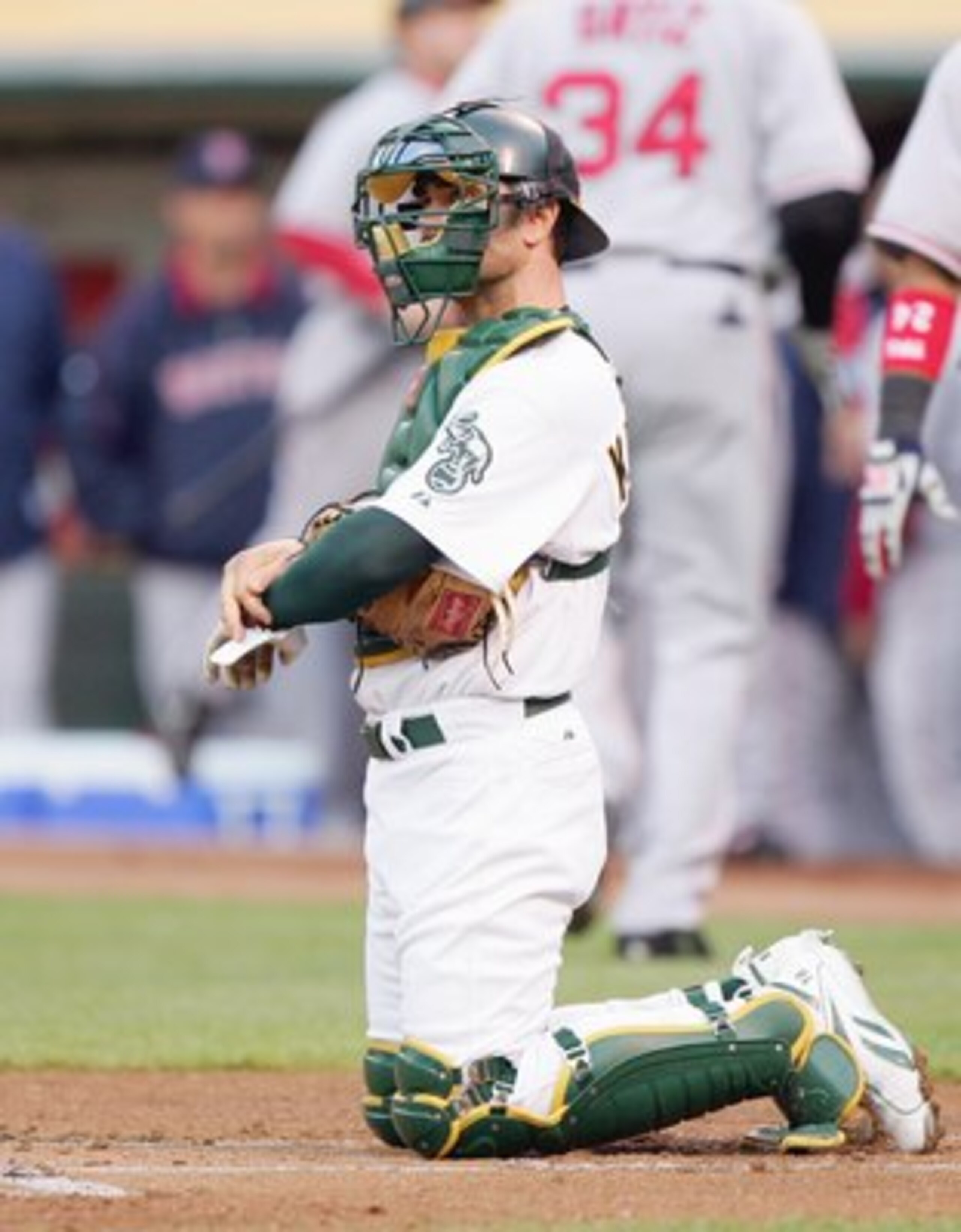 OAKLAND, CA - JUNE 04:  Jason Kendall #18 of the Oakland Athletics kneels behind the plate against the Boston Red Sox during a Major League Baseball game on June 4, 2007 at McAfee Coliseum in Oakland, California. (Photo by Jed Jacobsohn/Getty Images)
