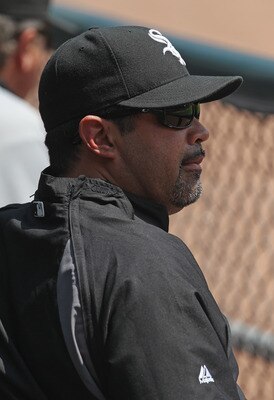 CHICAGO, IL - MAY 22:  Manager Ozzie Guillen #13 of the Chicago White Sox watches as his team takes on the Los Angeles Dodgers at U.S. Cellular Field on May 22, 2011 in Chicago, Illinois. The White Sox defeated the Dodgers 8-3.  (Photo by Jonathan Daniel/