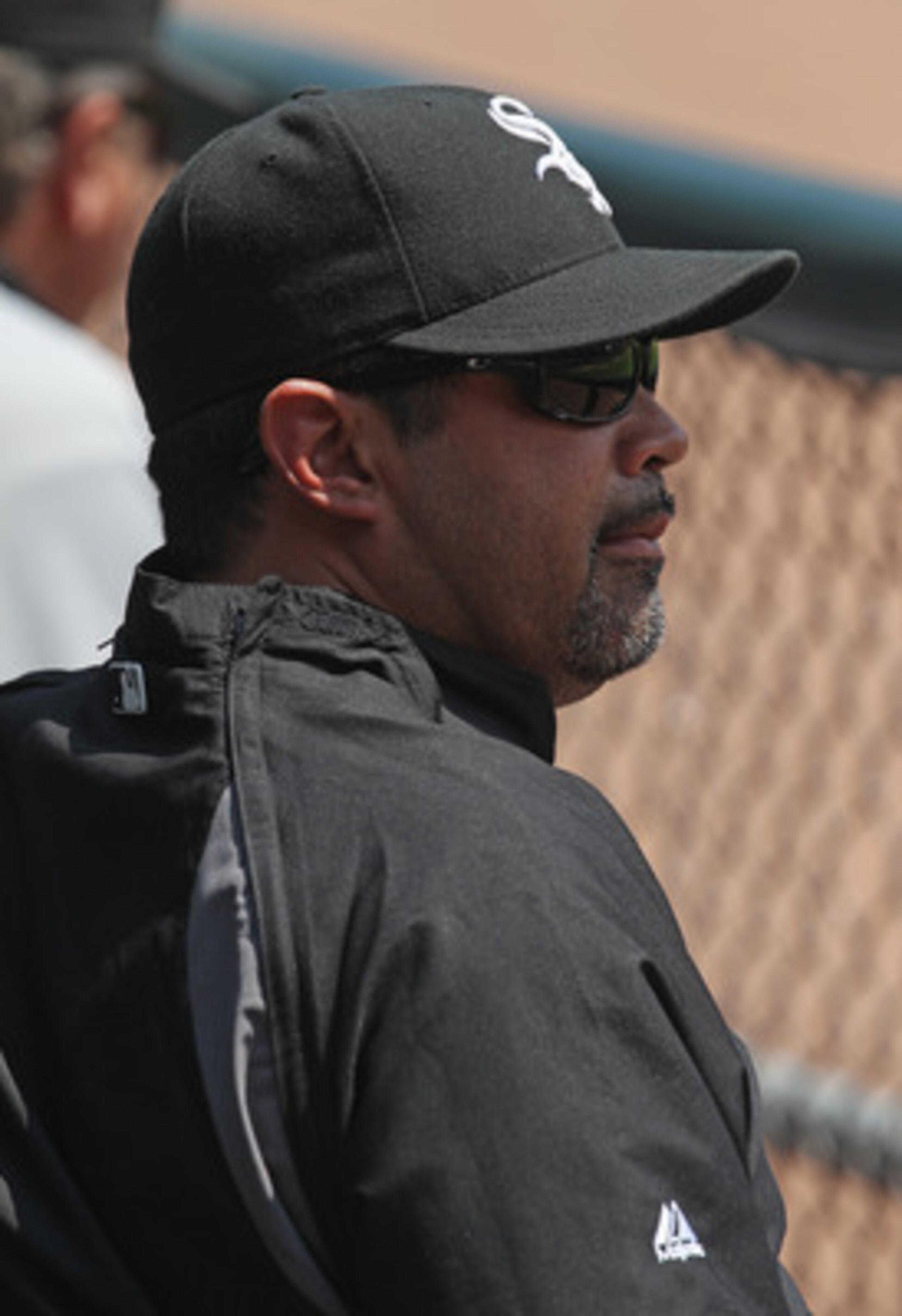CHICAGO, IL - MAY 22:  Manager Ozzie Guillen #13 of the Chicago White Sox watches as his team takes on the Los Angeles Dodgers at U.S. Cellular Field on May 22, 2011 in Chicago, Illinois. The White Sox defeated the Dodgers 8-3.  (Photo by Jonathan Daniel/