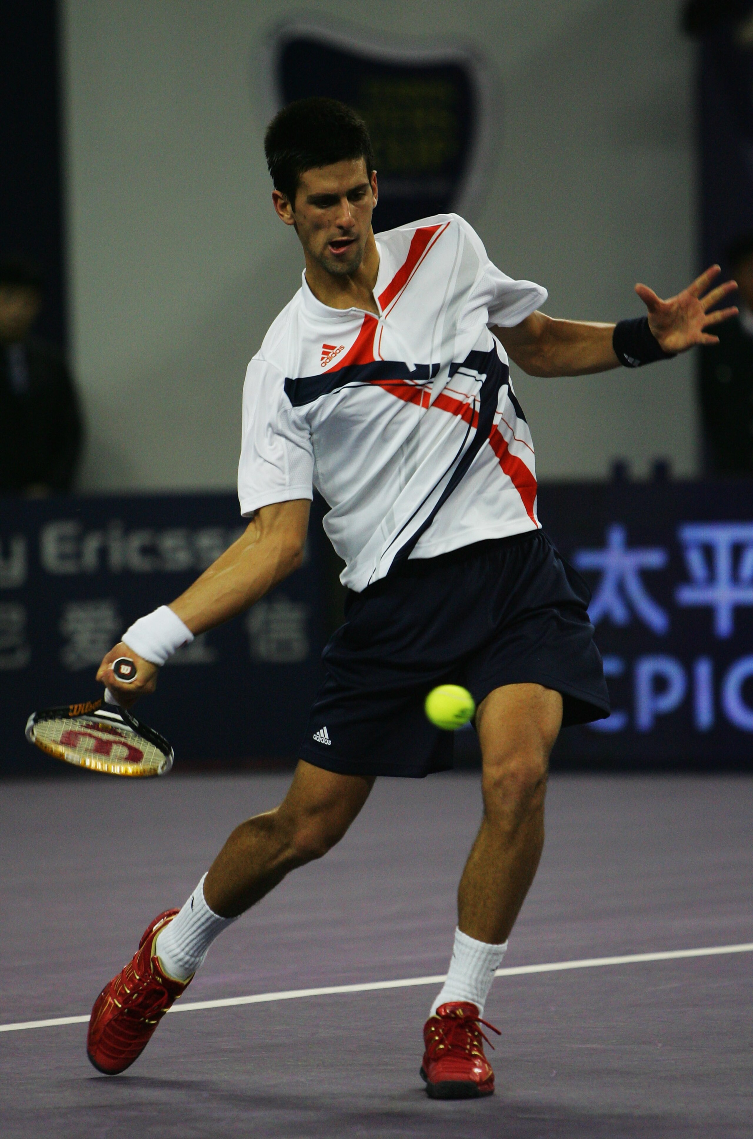 SHANGHAI, CHINA - NOVEMBER 15:  Novak Djokovic of Serbia returns a shot during his round robin match against Rafael Nadal of Spain in the Tennis Masters Cup at Qi Zhong Stadium on November 15, 2007 in Shanghai, China.  (Photo by Andrew Wong/Getty Images)