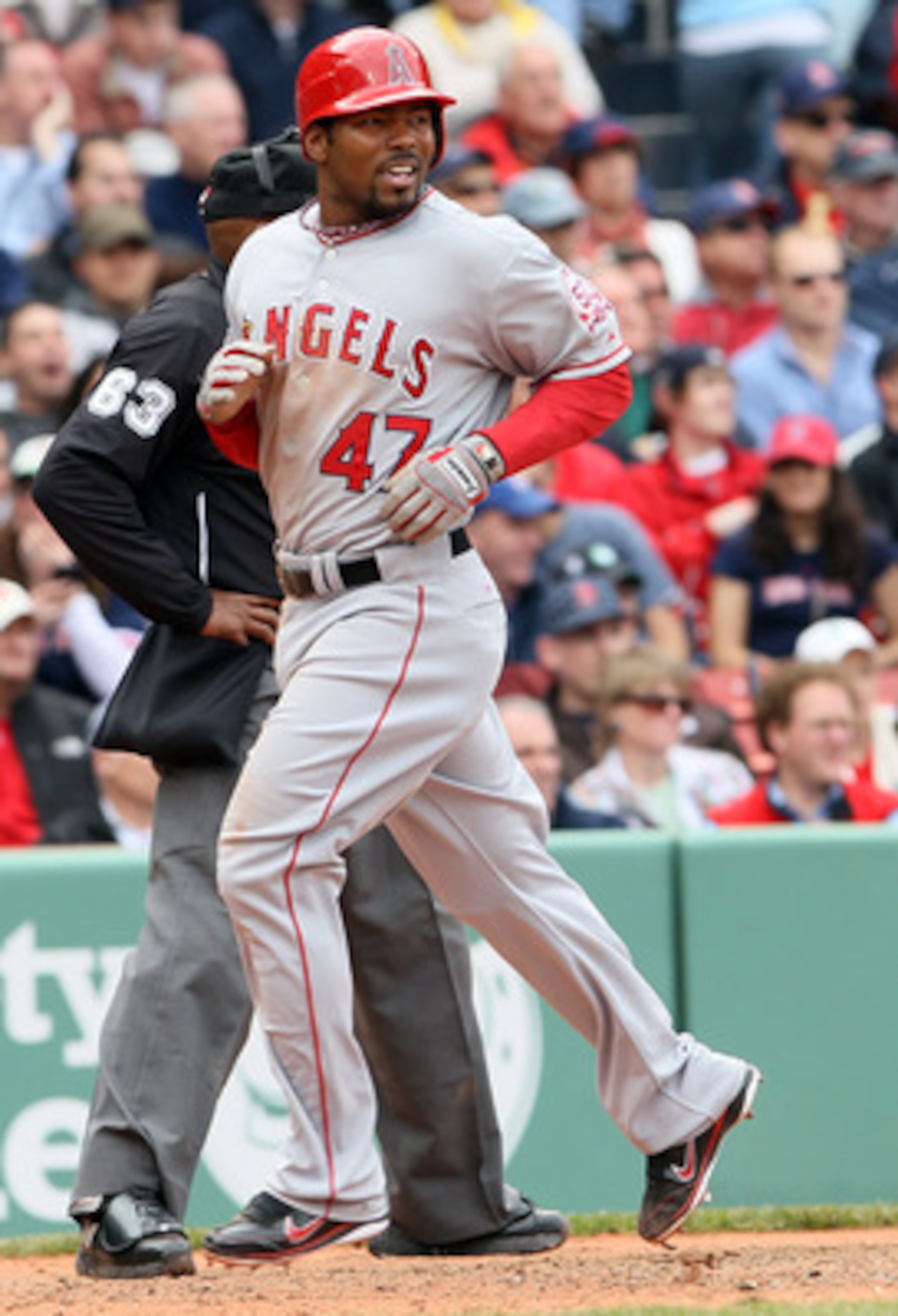BOSTON, MA - MAY 05:  Howard Kendrick #47 of the Los Angeles Angels scores in the fourth inning against the Boston Red Sox on May 5, 2011 at Fenway Park in Boston, Massachusetts.  (Photo by Elsa/Getty Images)