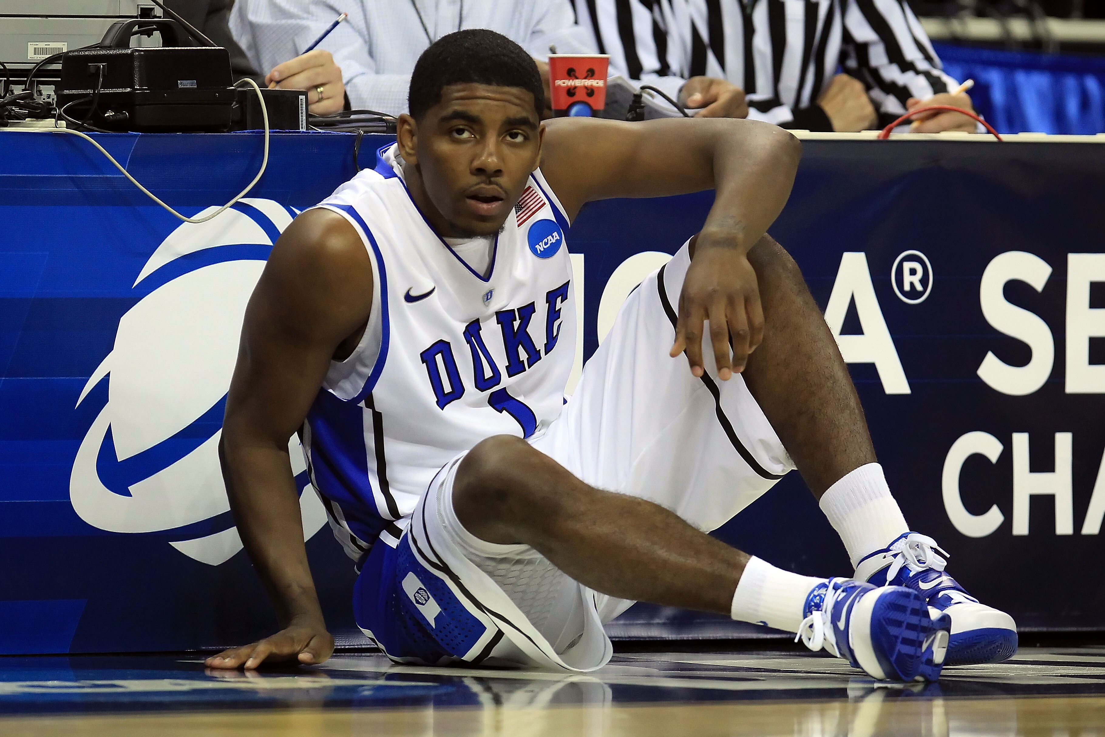 CHARLOTTE, NC - MARCH 18:  Kyrie Irving #1 of the Duke Blue Devils waits to enter the game in the first half while taking on the Duke Blue Devils during the second round of the 2011 NCAA men's basketball tournament at Time Warner Cable Arena on March 18,