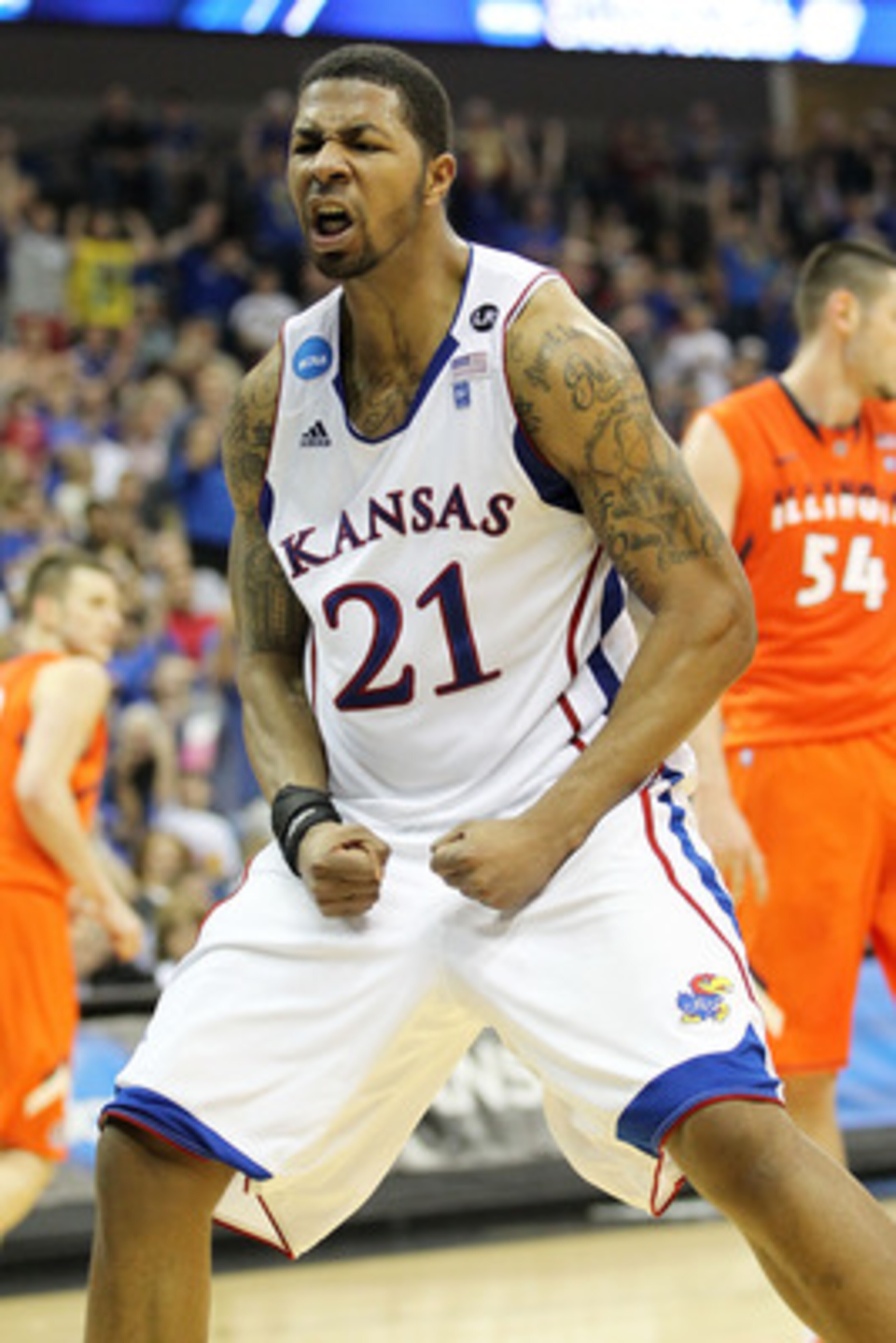 TULSA, OK - MARCH 20:  Markieff Morris #21 of the Kansas Jayhawks celebrates after a dunk against the Illinois Fighting Illini during the third round of the 2011 NCAA men's basketball tournament at BOK Center on March 20, 2011 in Tulsa, Oklahoma.  (Photo