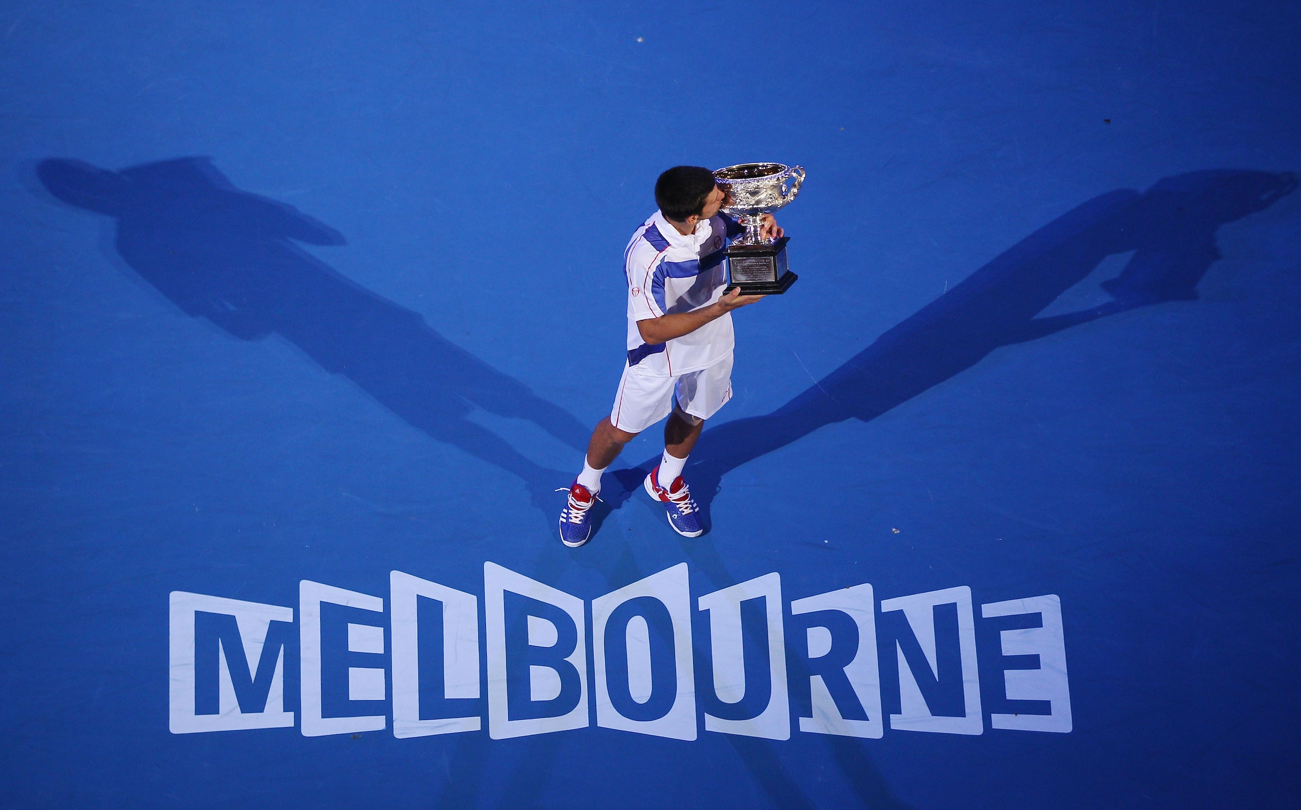 MELBOURNE, AUSTRALIA - JANUARY 30:  Novak Djokovic of Serbia holds the Norman Brookes Challenge Cup after winning his men's final match against Andy Murray of Great Britain during day fourteen of the 2011 Australian Open at Melbourne Park on January 30, 2