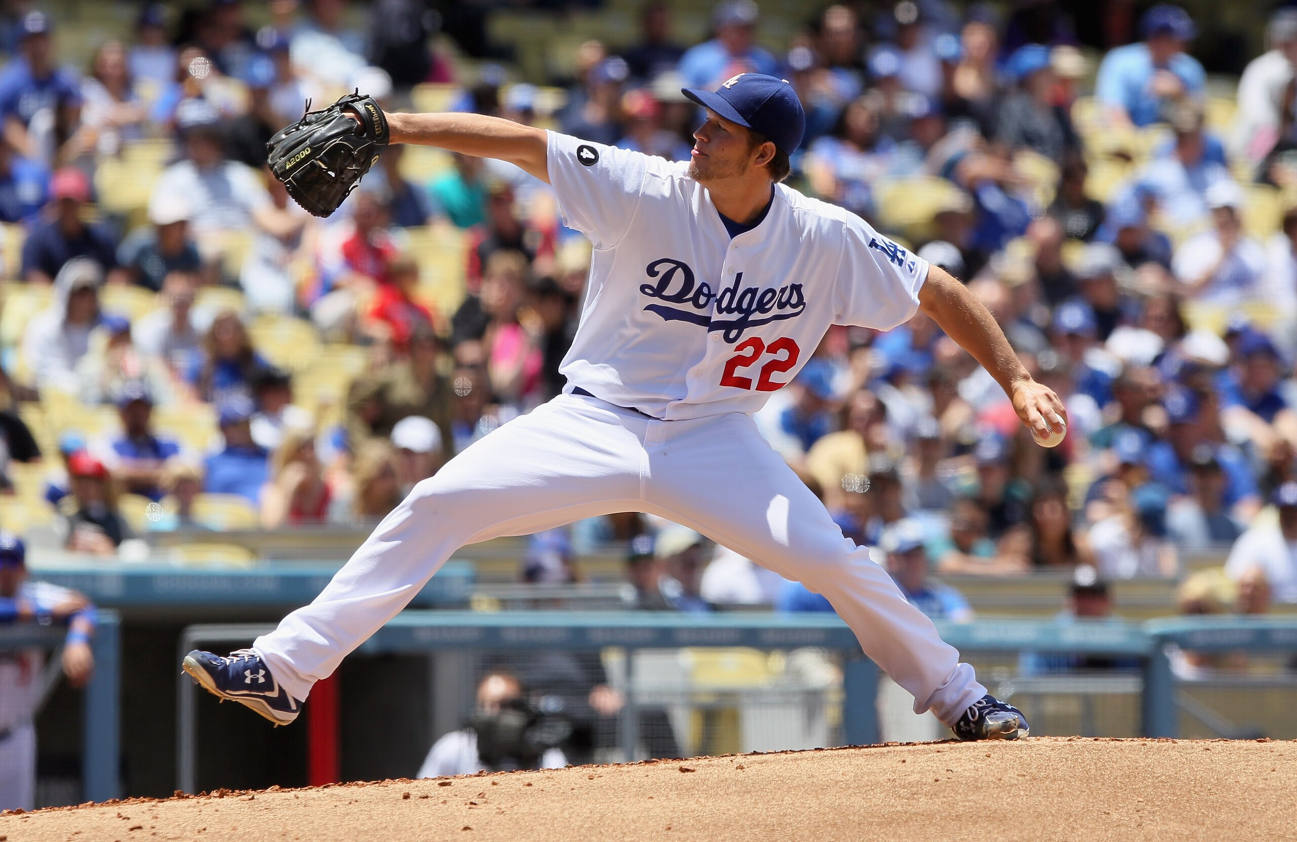 LOS ANGELES, CA - MAY 29:  Clayton Kershaw #22 of the Los Angeles Dodgers pitches against the Florida Marlins in the second inning against at Dodger Stadium on May 29, 2011 in Los Angeles, California.  (Photo by Jeff Gross/Getty Images)