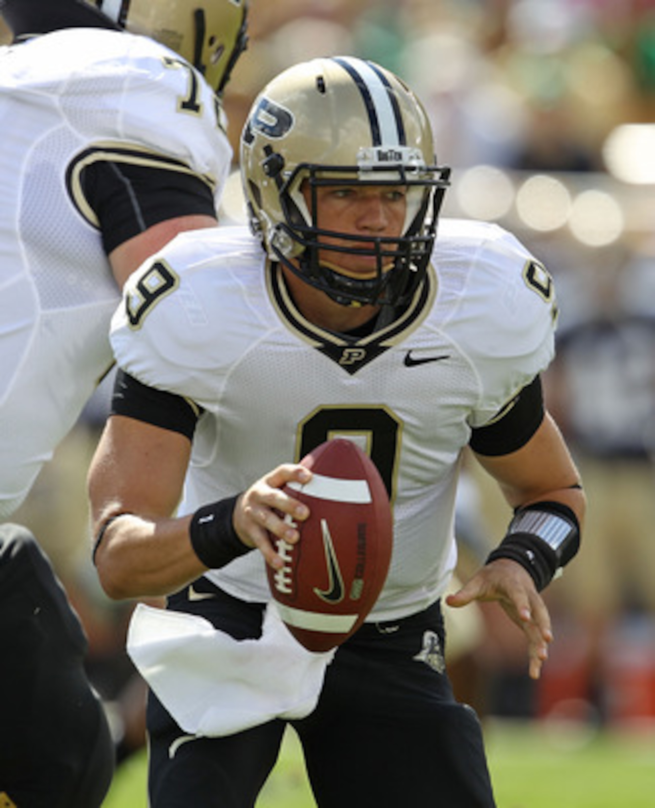 SOUTH BEND, IN - SEPTEMBER 04: Robert Marve #9 of the Purdue Boilermakers turns to roll out against the Notre Dame Fighting Irish at Notre Dame Stadium on September 4, 2010 in South Bend, Indiana. Notre Dame defated Purdue 23-12. (Photo by Jonathan Daniel